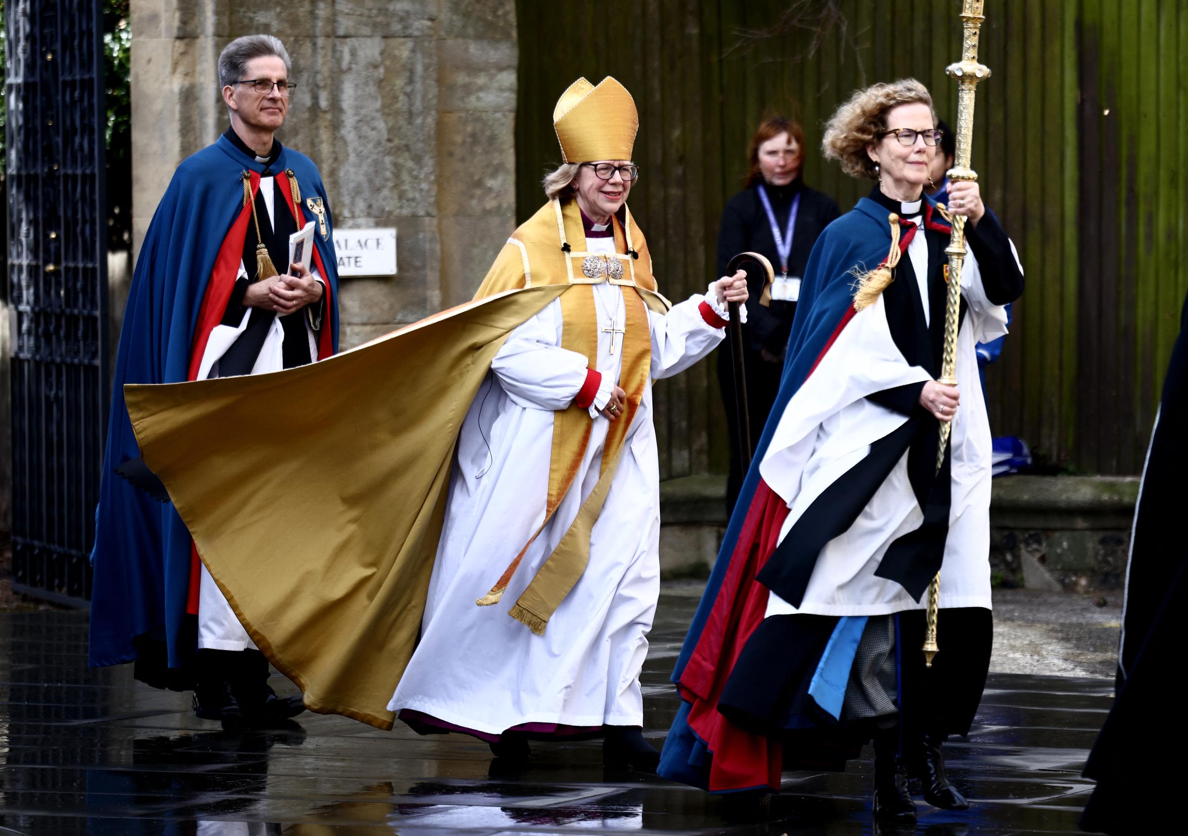 Her gold robes catching the morning air as she strode through the Palace Gate on 25 March 2026, Mullally arrived at Canterbury Cathedral to begin the ceremony that would formally install her as the 106th Archbishop of Canterbury — one of more than 2,000 guests already inside were William, Prince of Wales, Catherine, Princess of Wales, and more.