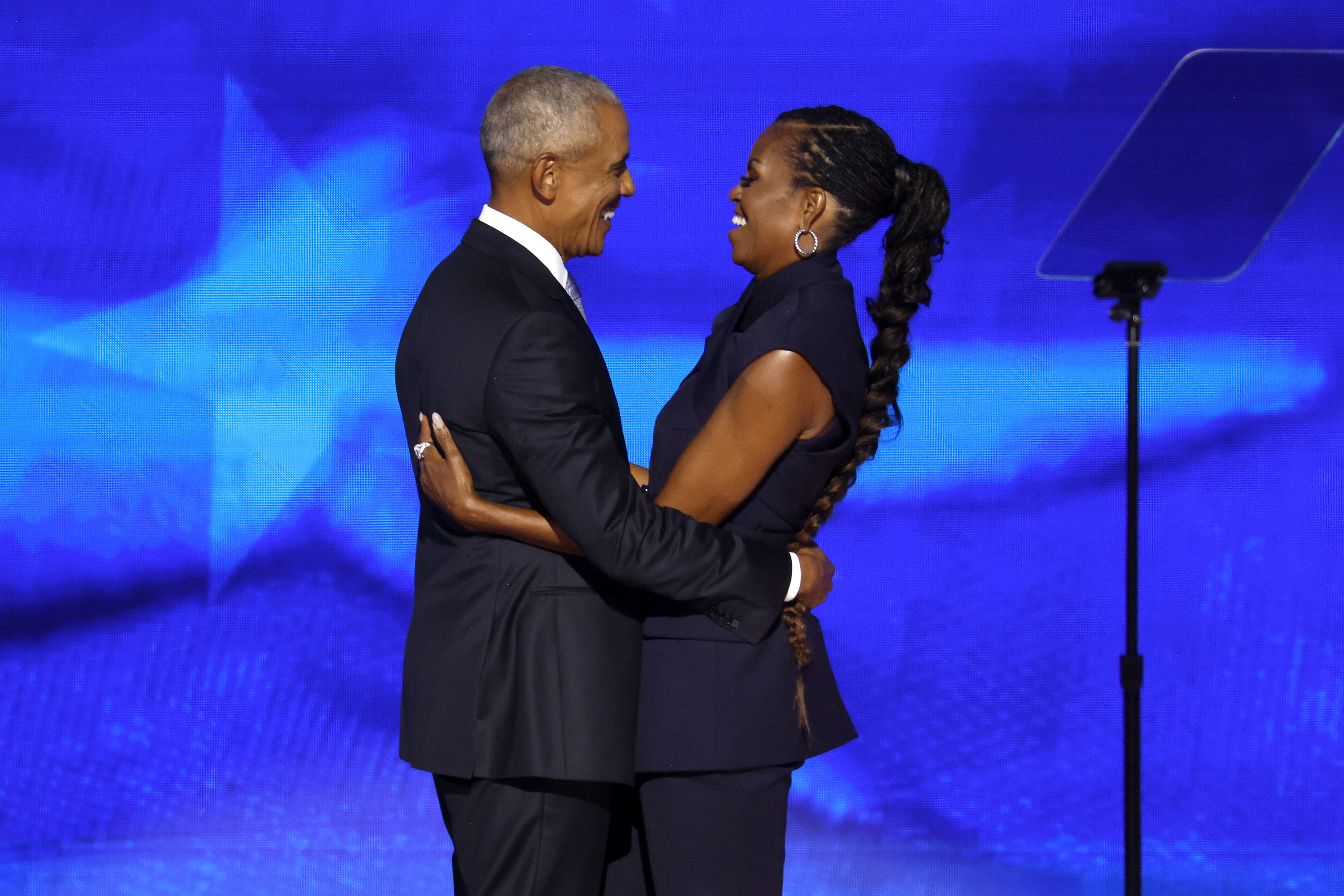 Barack and Michelle Obama on stage during the second day of the Democratic National Convention at the United Center on August 20, 2024, in Chicago, Illinois. | Source: Getty Images