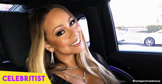 Mariah Carey, 48, flaunts her slim curves, posing with shirtless boyfriend, 35, on yacht in new pic