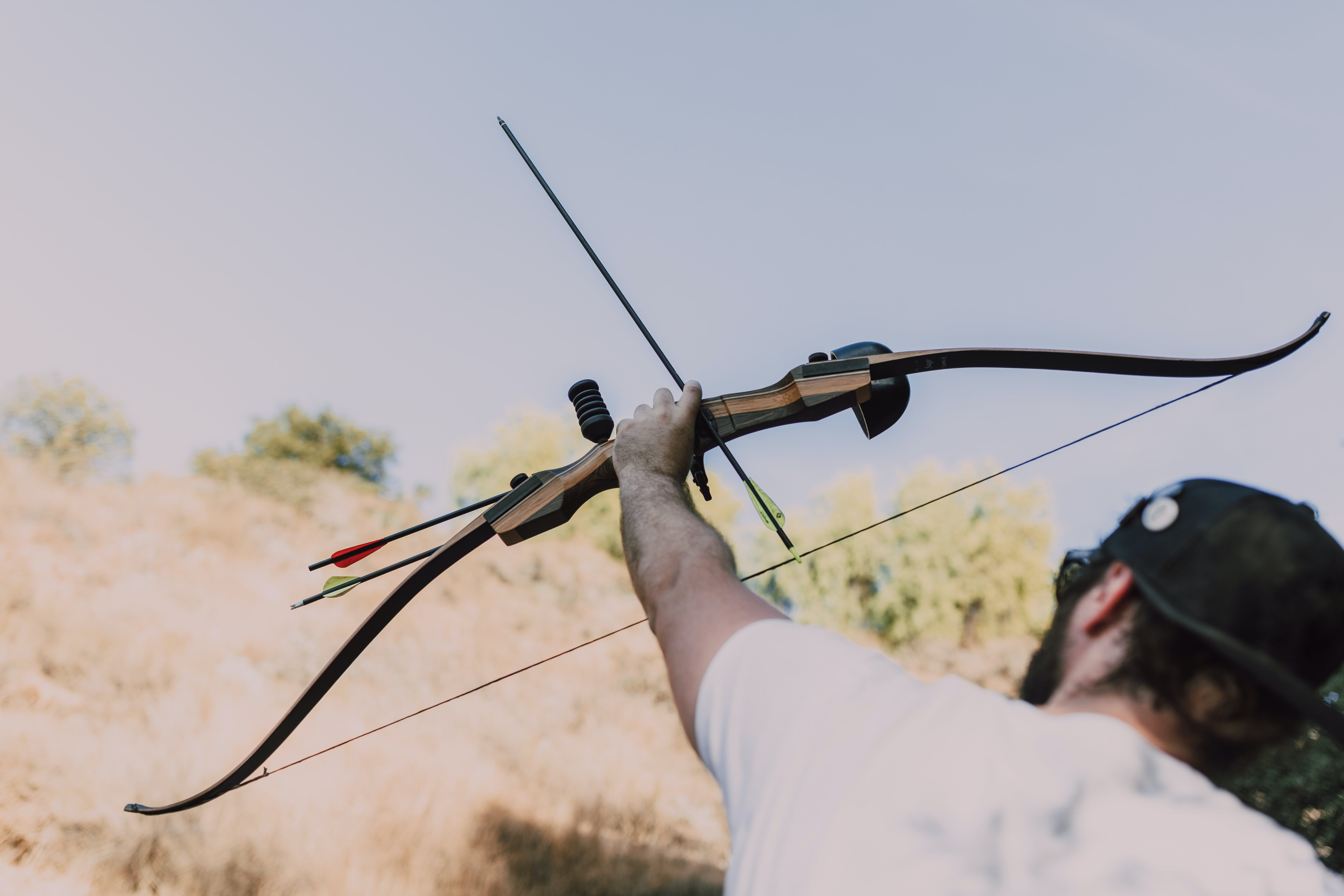 A person hunting in a forest. | Source: Pexels