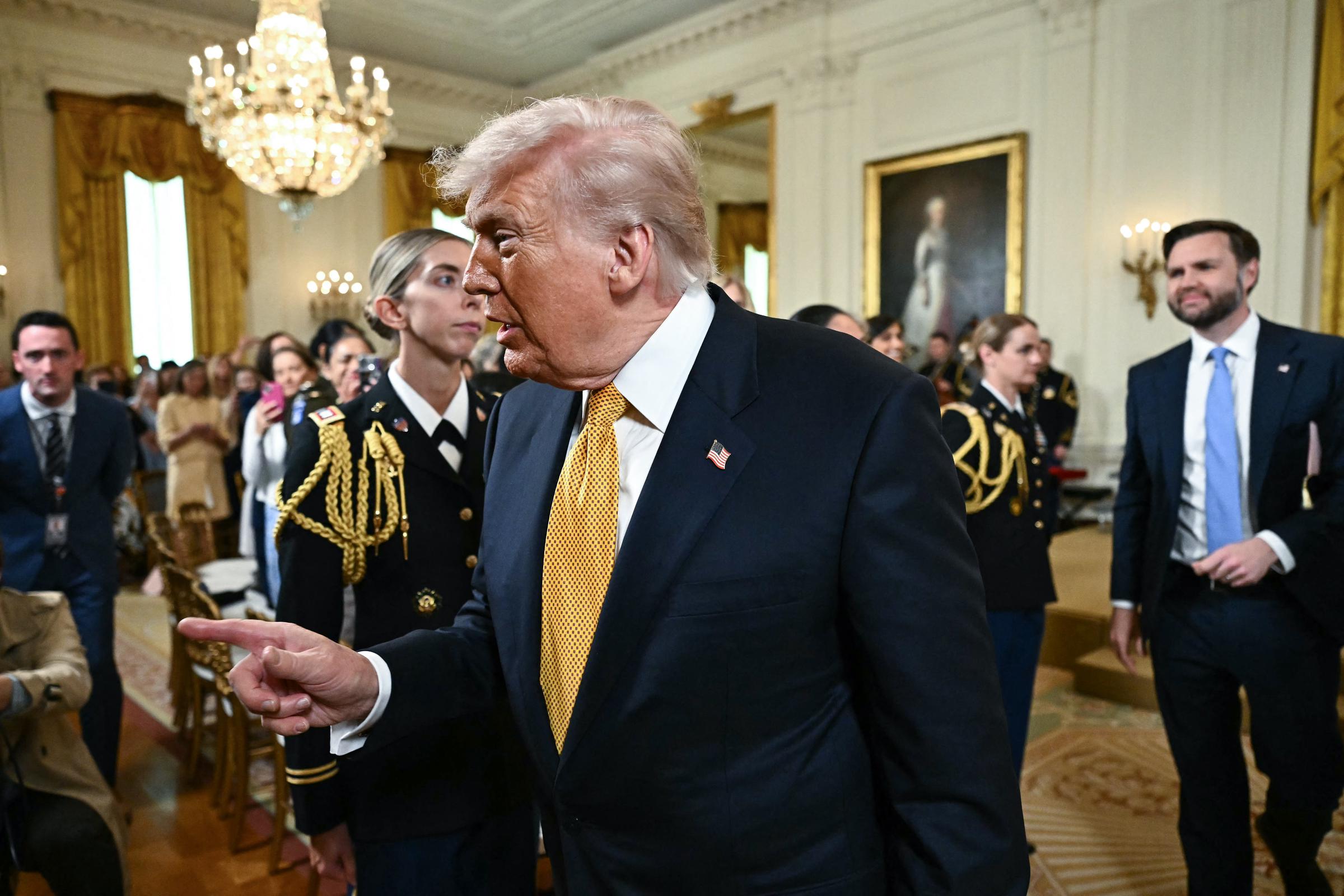 Donald Trump and JD Vance depart after a Military Mother's Day Event in the East Room of the White House on May 6, 2026, in Washington, DC | Source: Getty Images