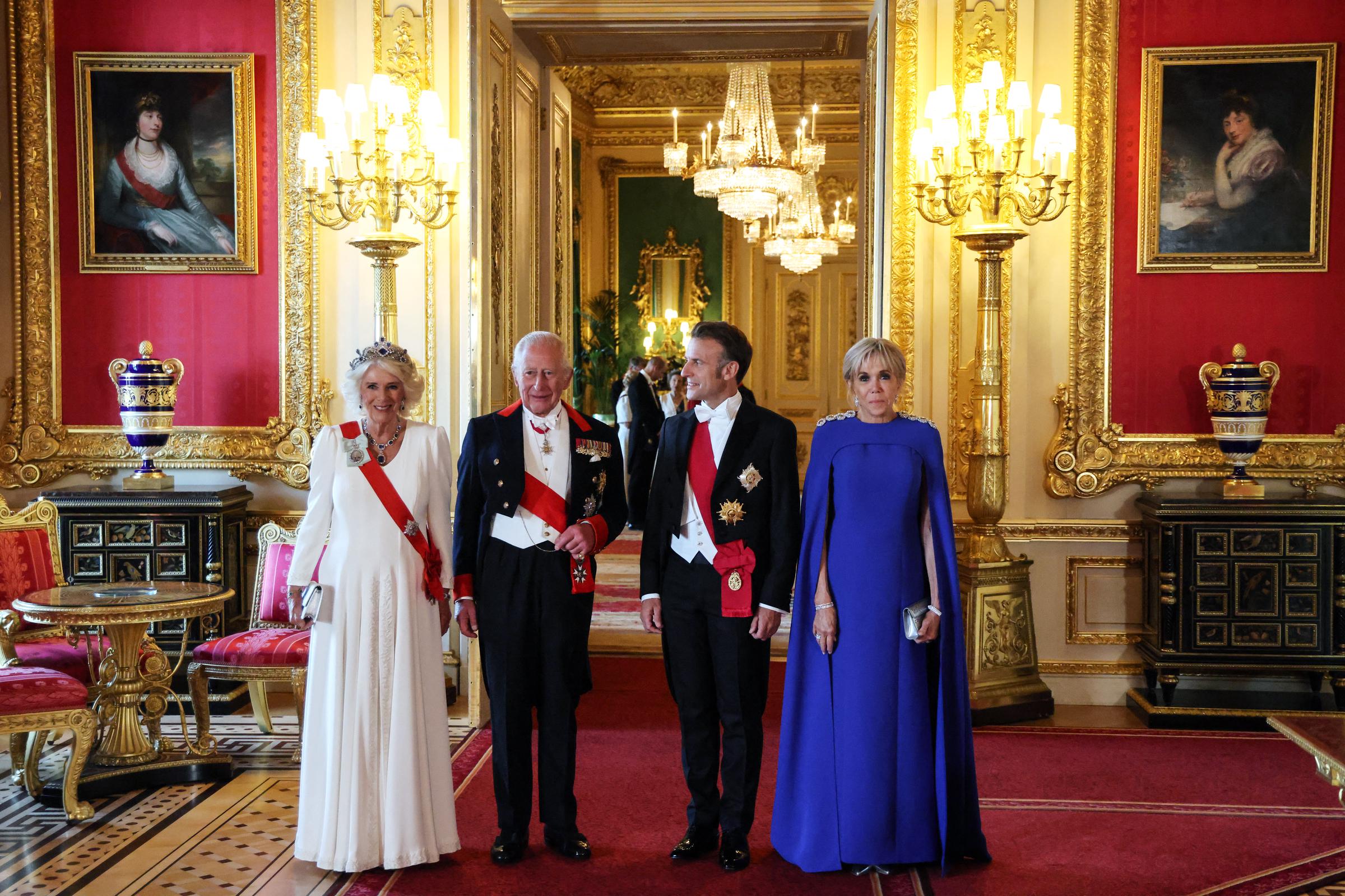 Queen Camilla and King Charles III with Emmanuel and Brigitte Macron at the State Banquet at Windsor Castle on July 8, 2025, in England. | Source: Getty Images