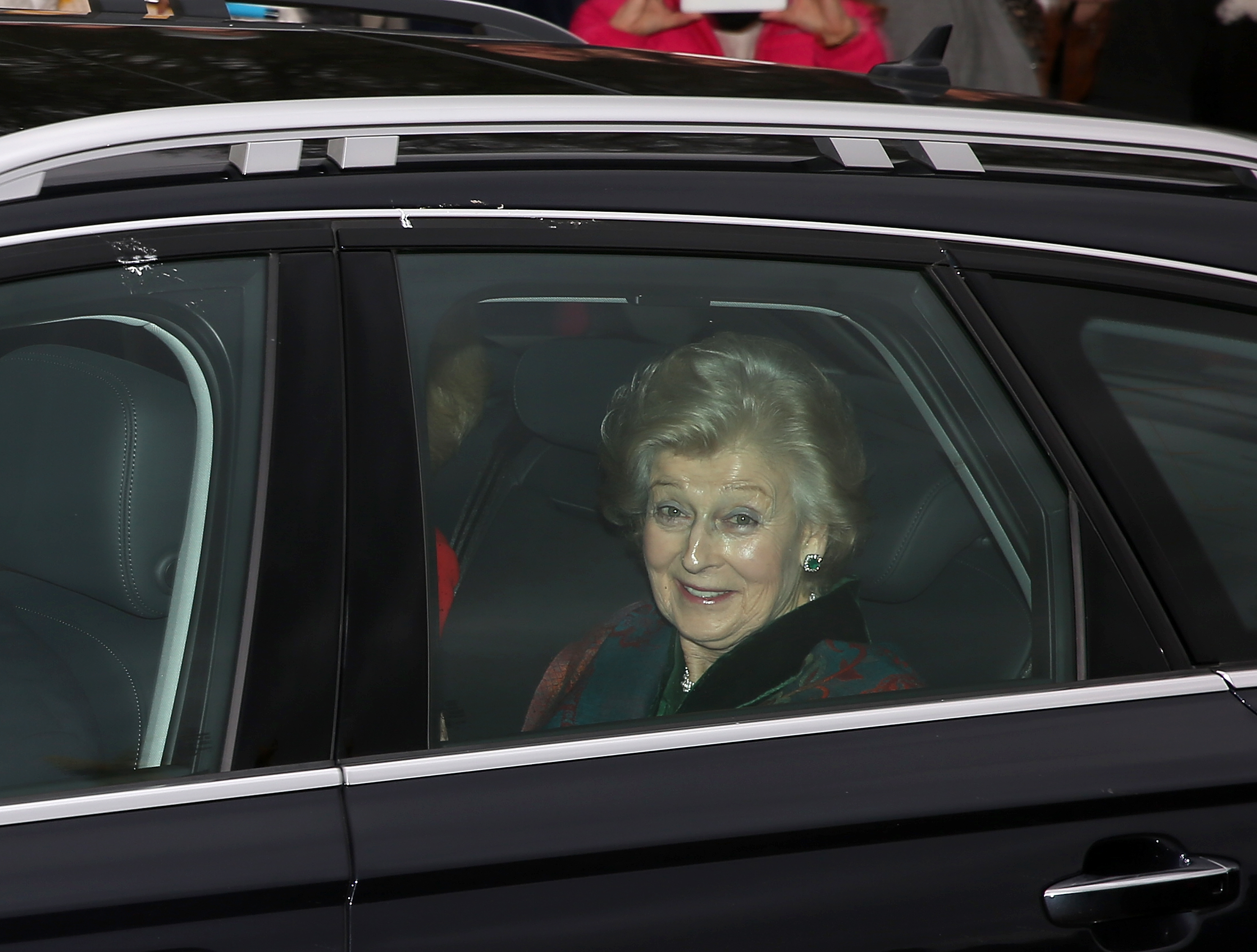 Smiling from the back seat of her car, Princess Alexandra arrives at Buckingham Palace for the Queen's Christmas lunch on 16 December 2015. Joining the extended Royal Family, she steps once more into the warmth and tradition of the festive gathering.