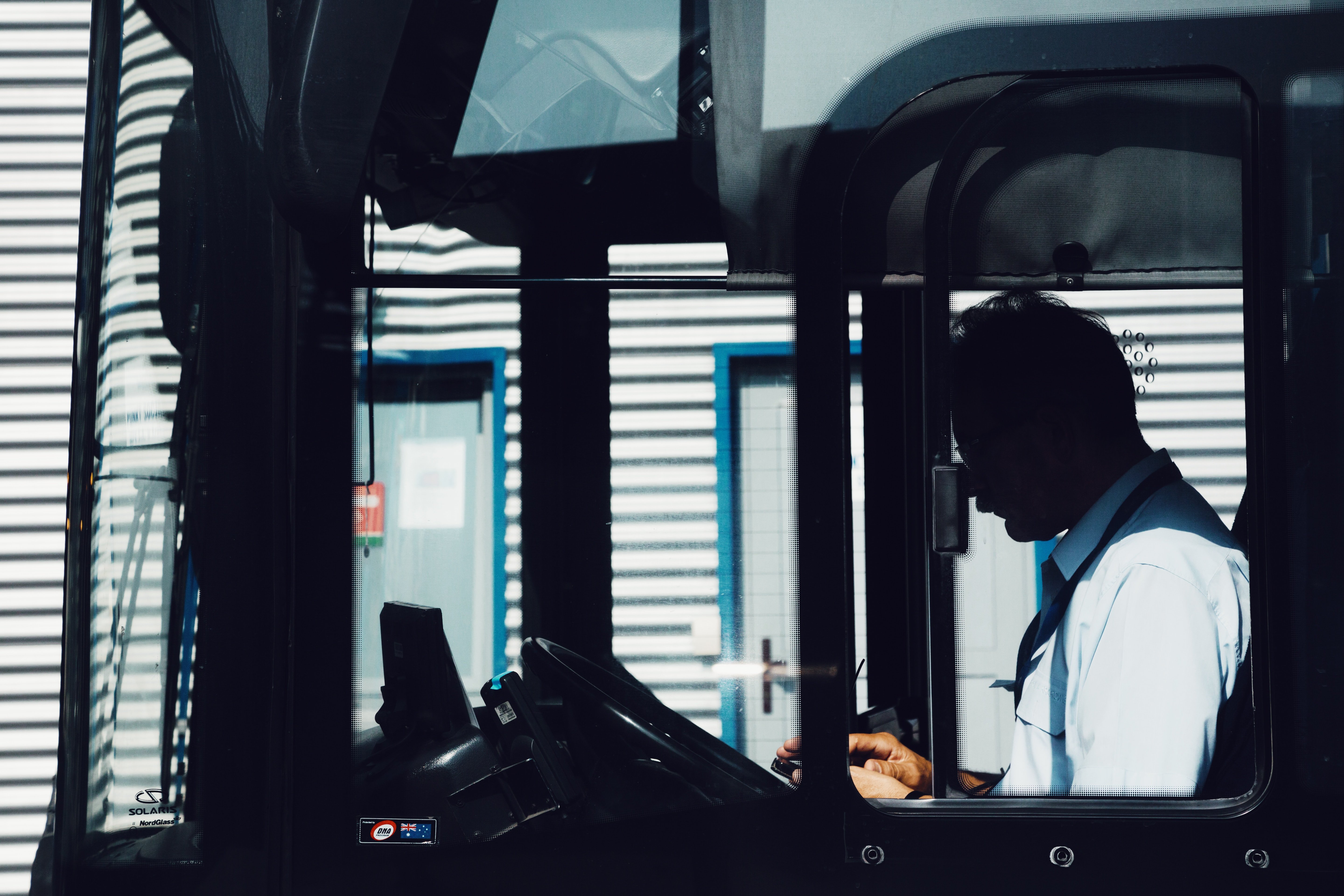 A bus driver driving a bus. | Source: Unsplash.com