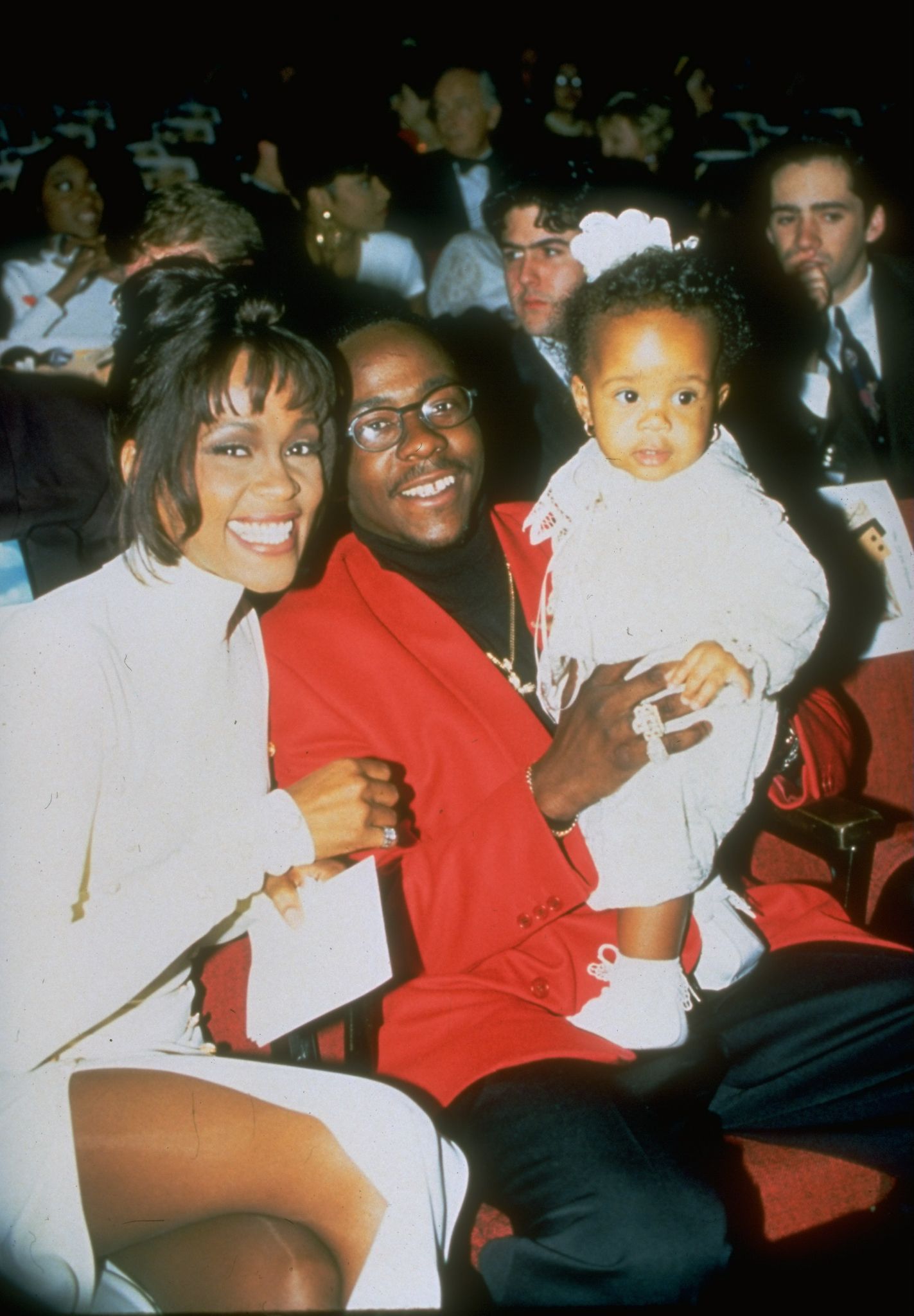 Whitney Houston, Bobby Brown, and Bobbi Kristina at an award ceremony in 1993 | Photo: Getty Images