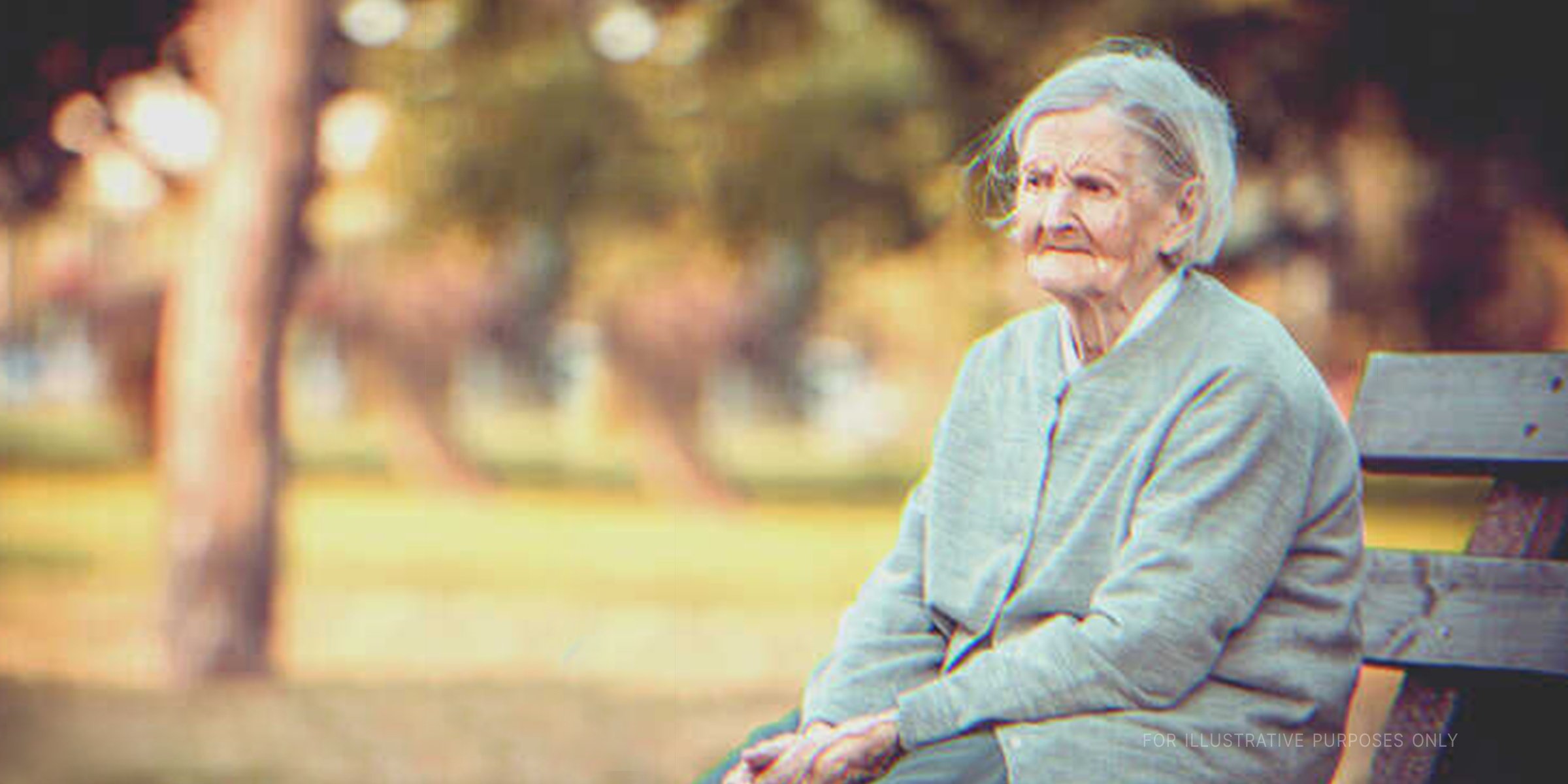 Old Lady Sitting On Park Bench | Source: Shutterstock 