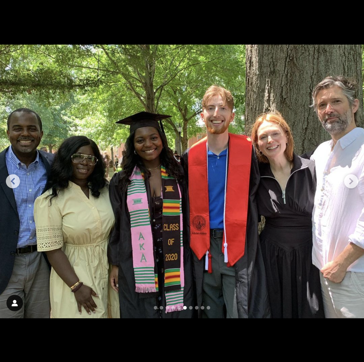 Caleb Freundlich and Kibriyaá Morgan celebrating their graduation with their families, as seen in a photo shared on May 25, 2022 | Source: Instagram/kikix12