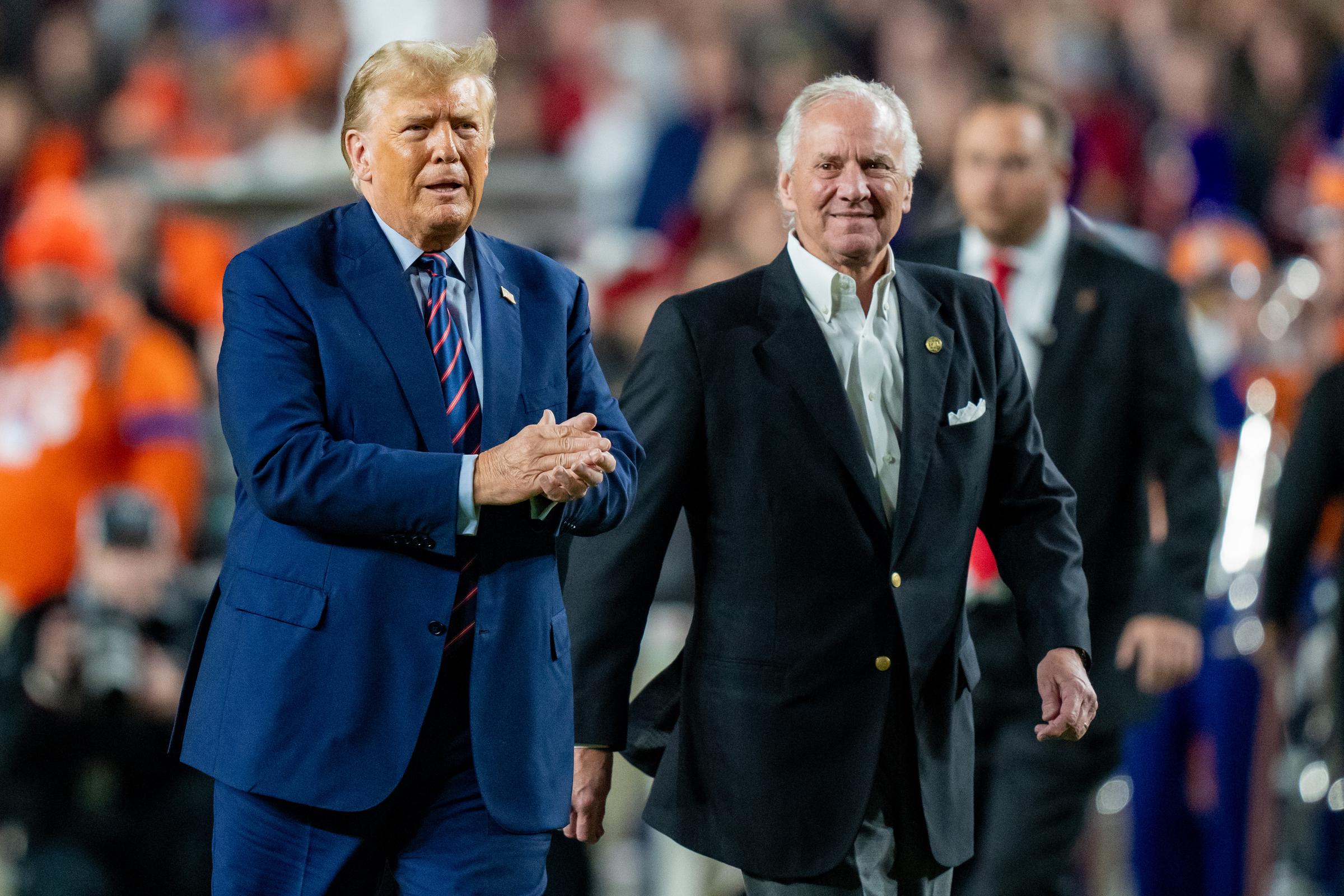 President Donald Trump appeared with South Carolina Governor Henry McMaster at a college football game in 2023. Trump later praised McMaster while discussing Graham’s vacant Senate seat, though he did not say whether he viewed the governor as a possible successor. | Source: Getty Images