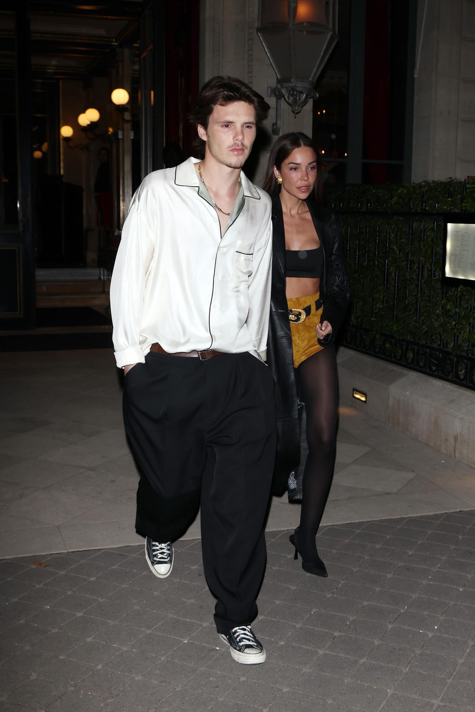 Jackie Apostel and Cruz Beckham leaving their hotel during the Womenswear Spring/Summer 2025 as part of Paris Fashion Week. | Source: Getty Images