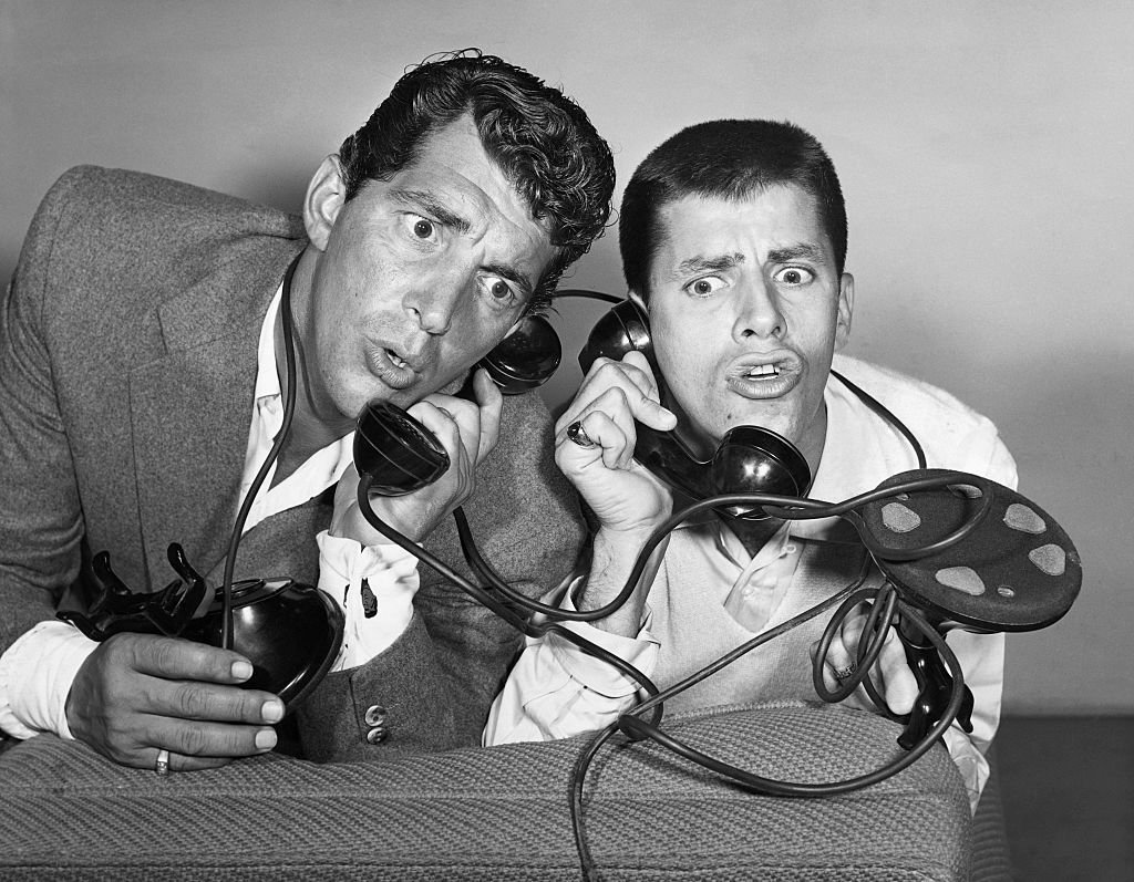 Dean Martin and Jerry Lewis, entertainers and hosts of their own NBC radio show, react at the news that the presentation of Redbook magazine's 14th Annual Silver Cup Movie Award will be made on their show. | Source: Getty Images