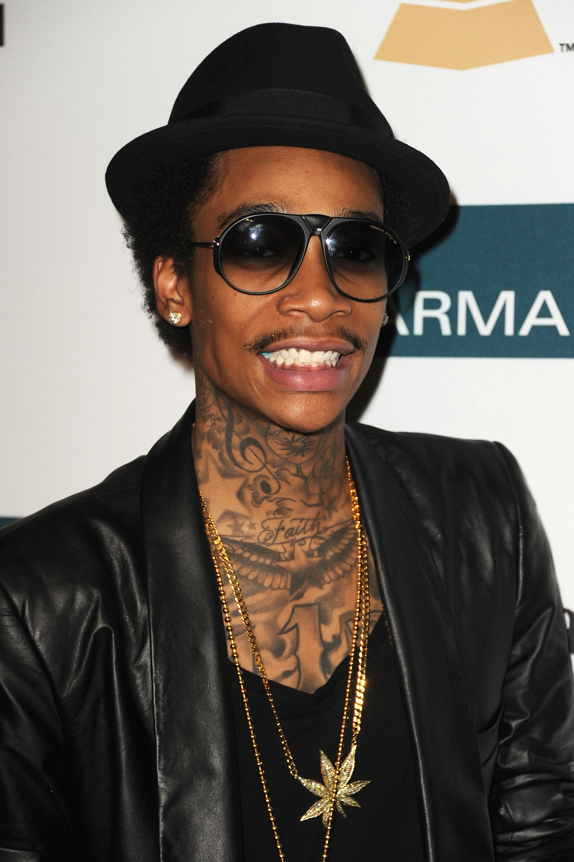 Wiz Khalifa arrives at Clive Davis and the Recording Academy's 2012 Pre-Grammy Gala and Salute to Industry Icons Honoring Richard Branson on February 11, 2012, in Beverly Hills, California. | Source: Getty Images