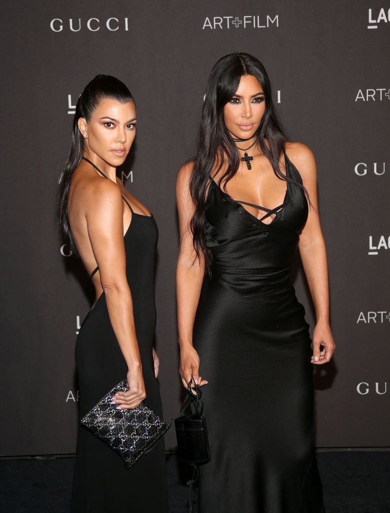 Kourtney Kardashian and Kim Kardashian at the 2018 LACMA Art + Film Gala. | Source: Getty Images 