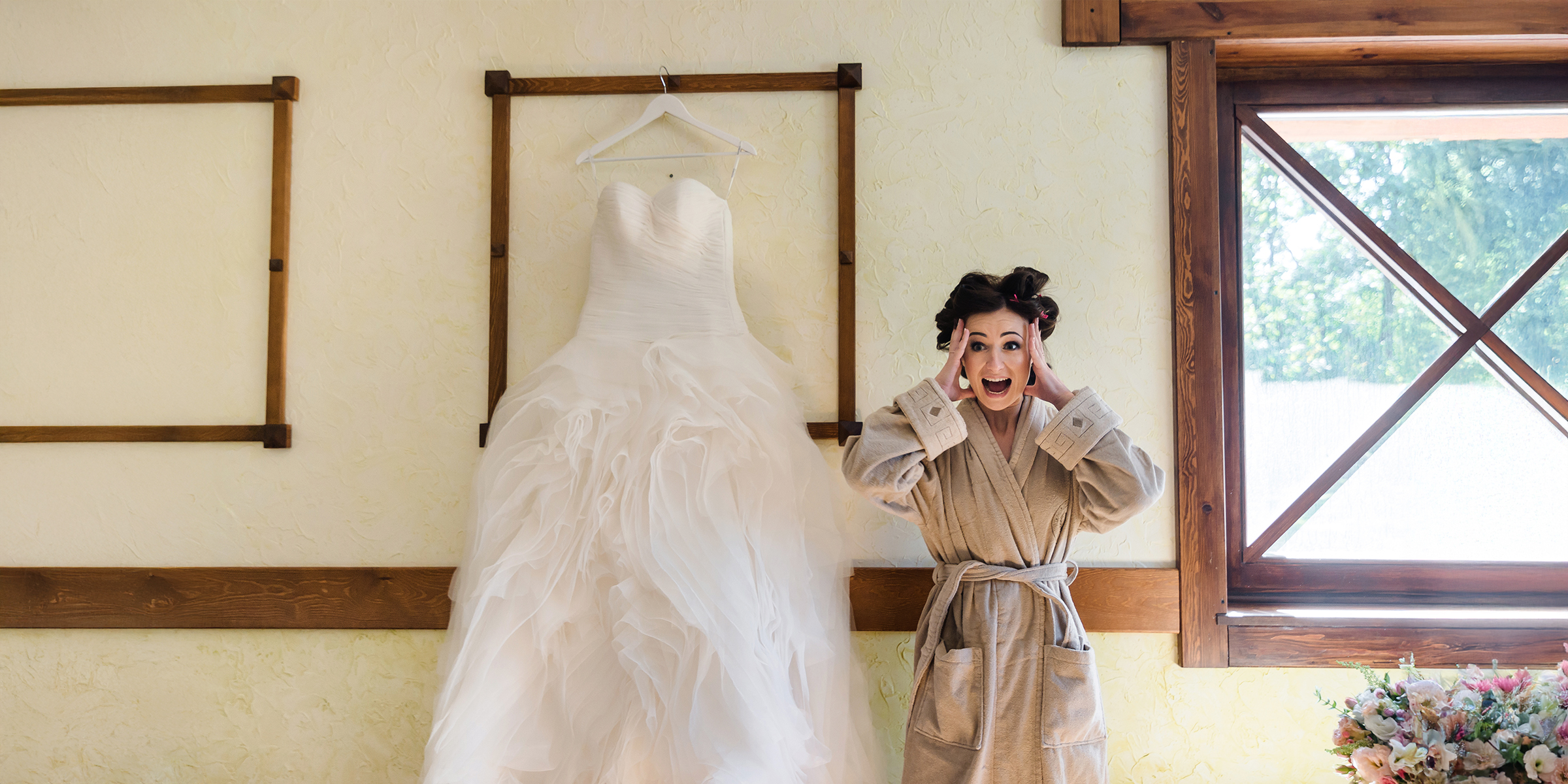 A shocked bride in a dressing room | Source: Shutterstock