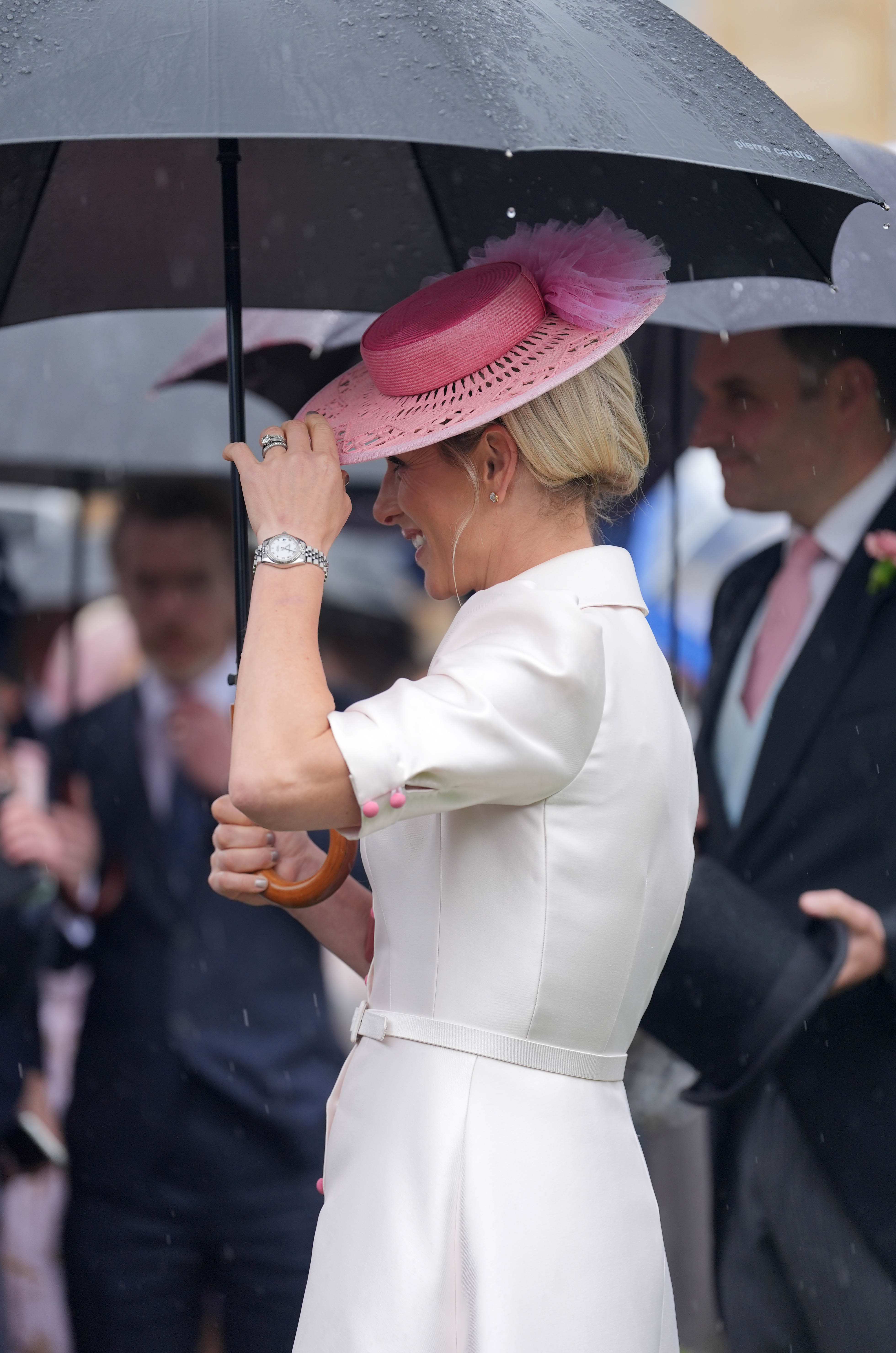 Zara Tindall strolls at the Sovereign's Garden Party at Buckingham Palace on May 21, 2024, in London, England. | Source: Getty Images