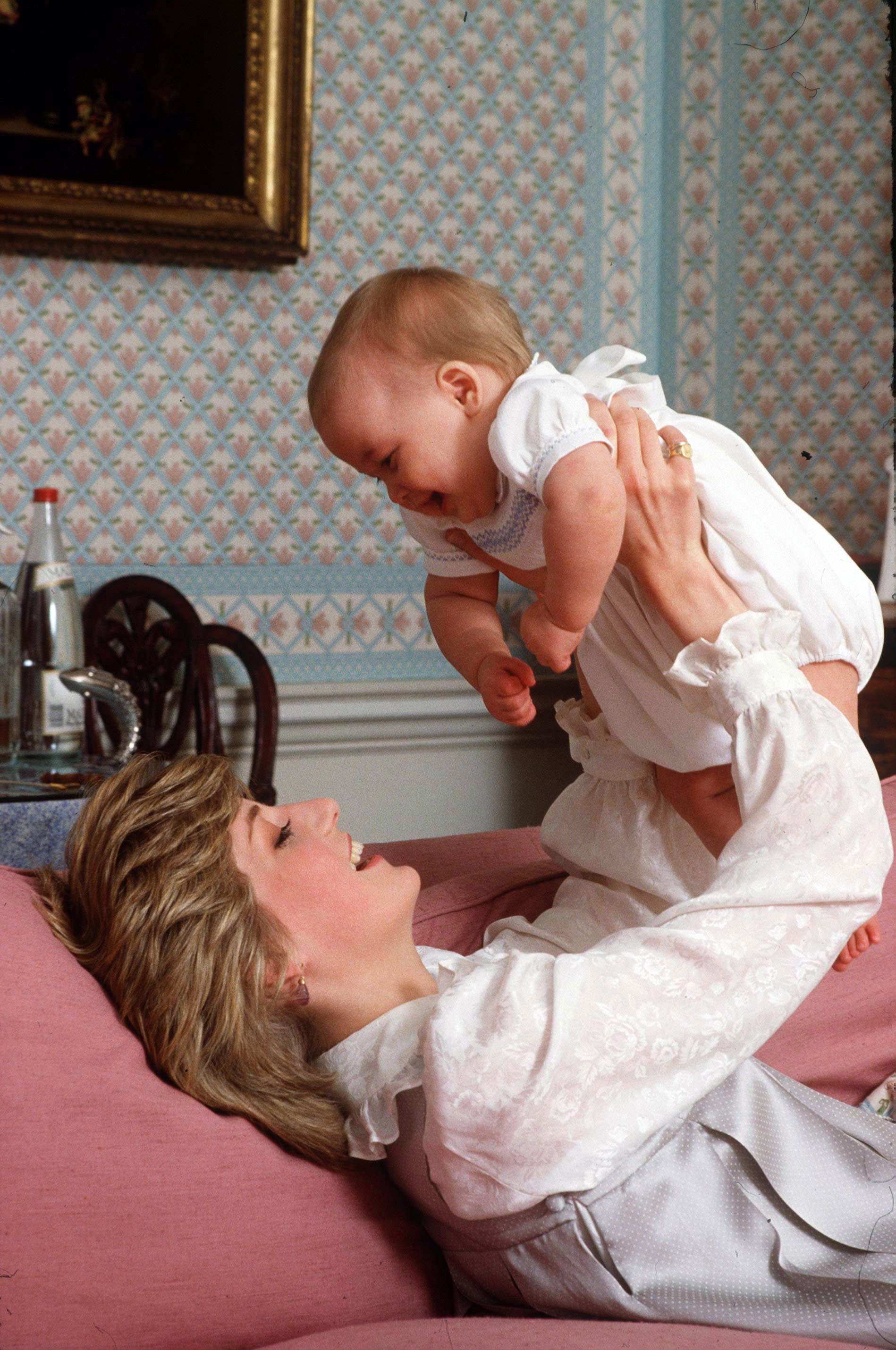 Princess Diana with Prince William at Kensington Palace in London, circa 1983. | Source: Getty Images