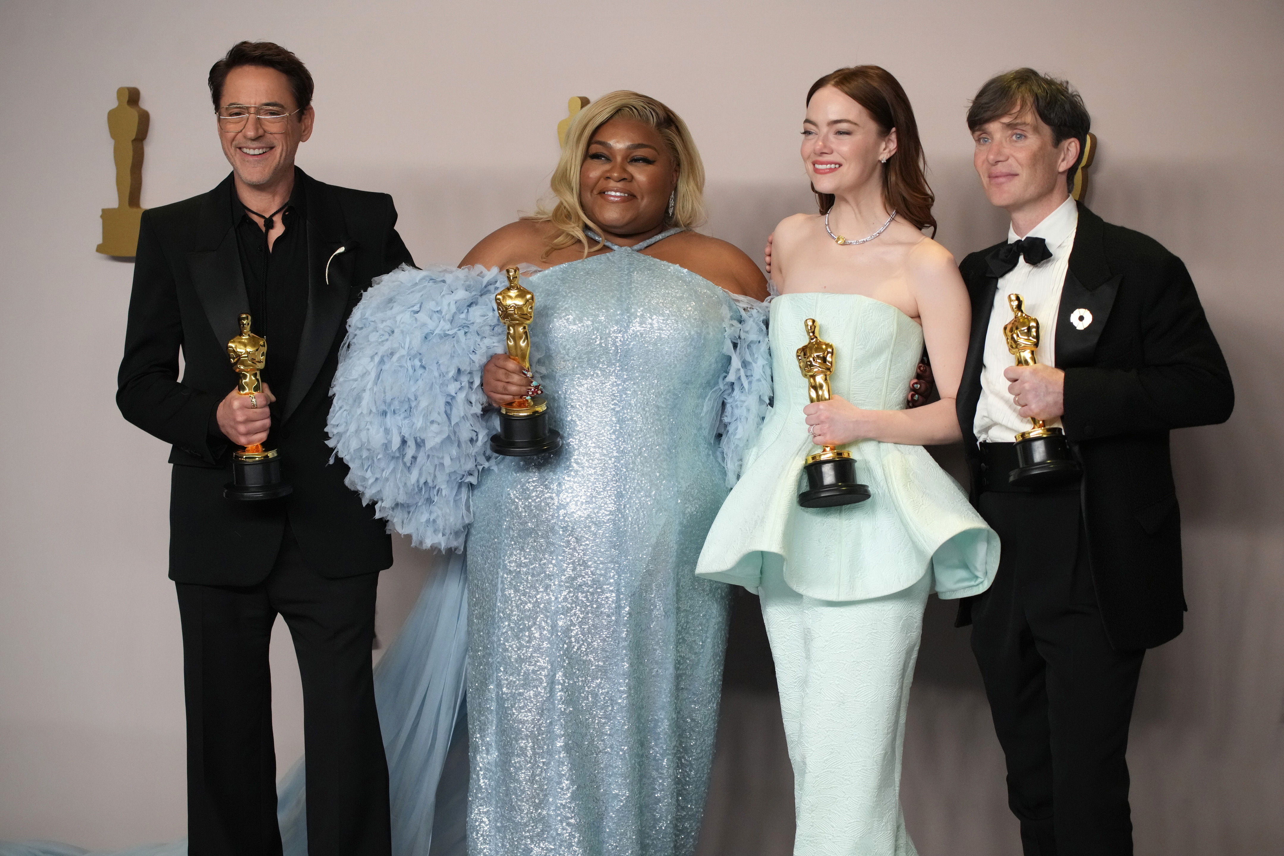 Robert Downey Jr., Best Actor in a Supporting Role, Da'Vine Joy Randolph, Best Supporting Actress, Emma Stone, Best Actress in a Leading Role, and Cillian Murphy, Best Actor in a Leading Role at the 96th Annual Academy Awards on March 10, 2024 | Source: Getty Images