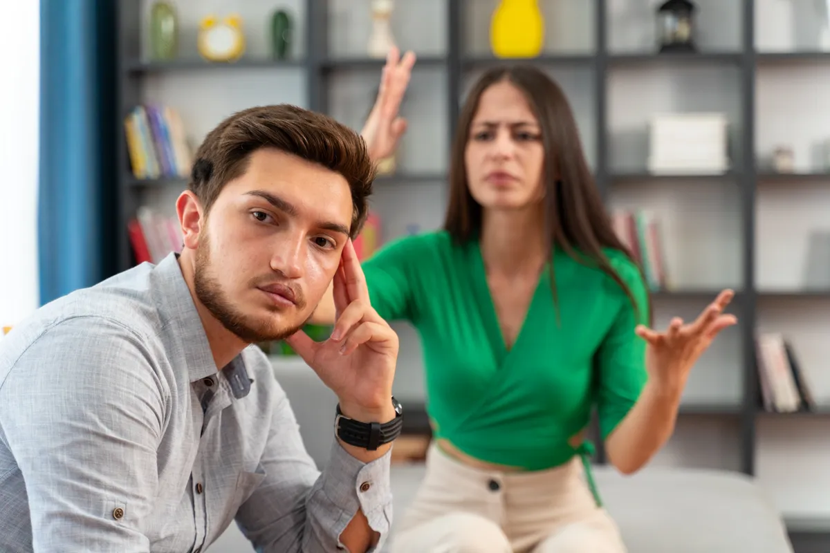 A man denying a woman's accusations | Source: Getty Images