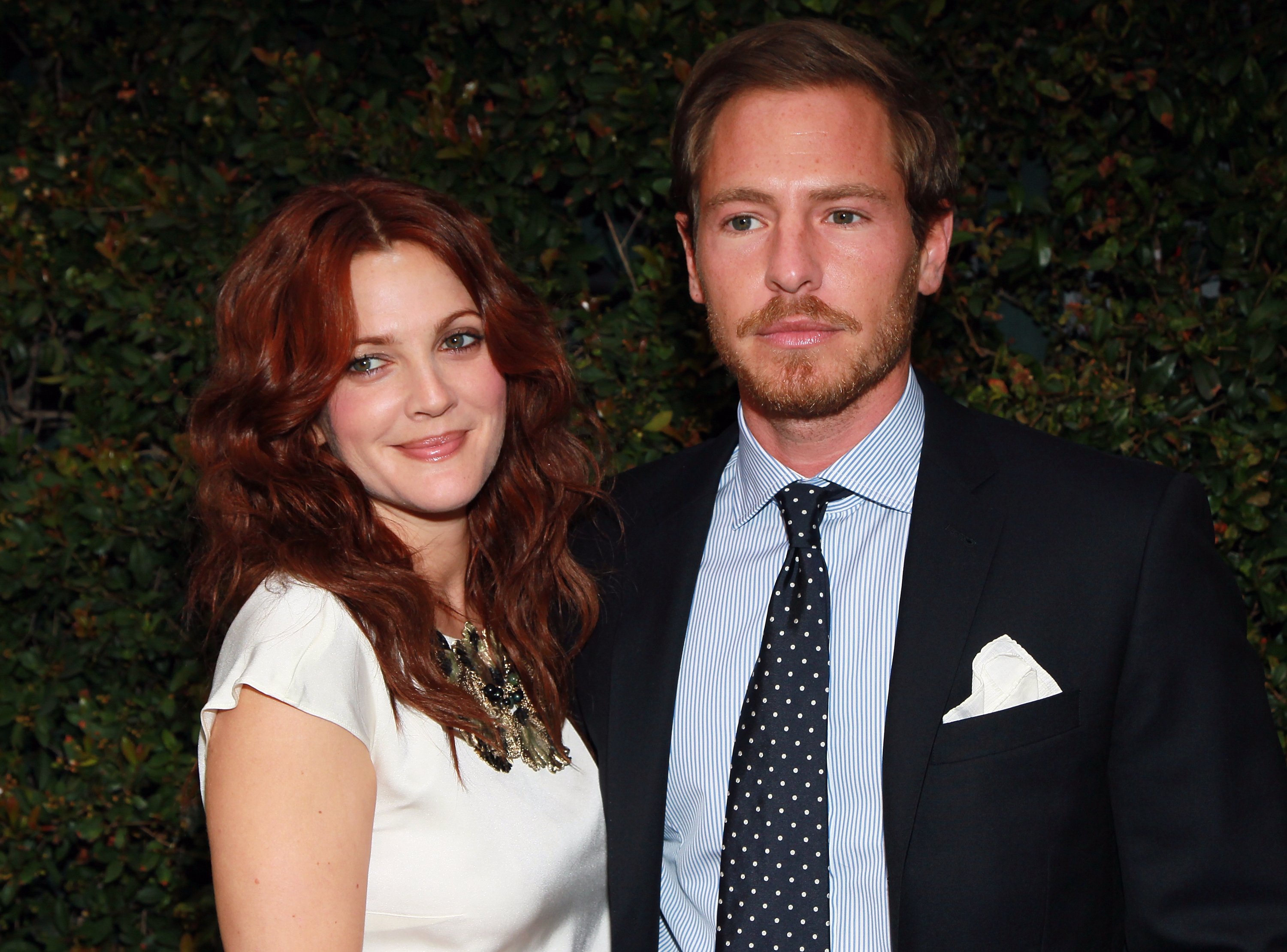 Actress Drew Barrymore and art consultant, Will Kopelman, during the Chanel's benefit dinner for the Natural Resources Defense Council's Ocean Initiative at the home of Ron & Kelly Meyer on June 4, 2011 in Malibu, California. / Source: Getty Images