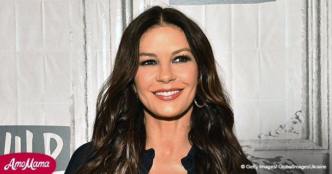 Catherine Zeta-Jones shows her age-defying figure wearing a tight pink gown in recent photo