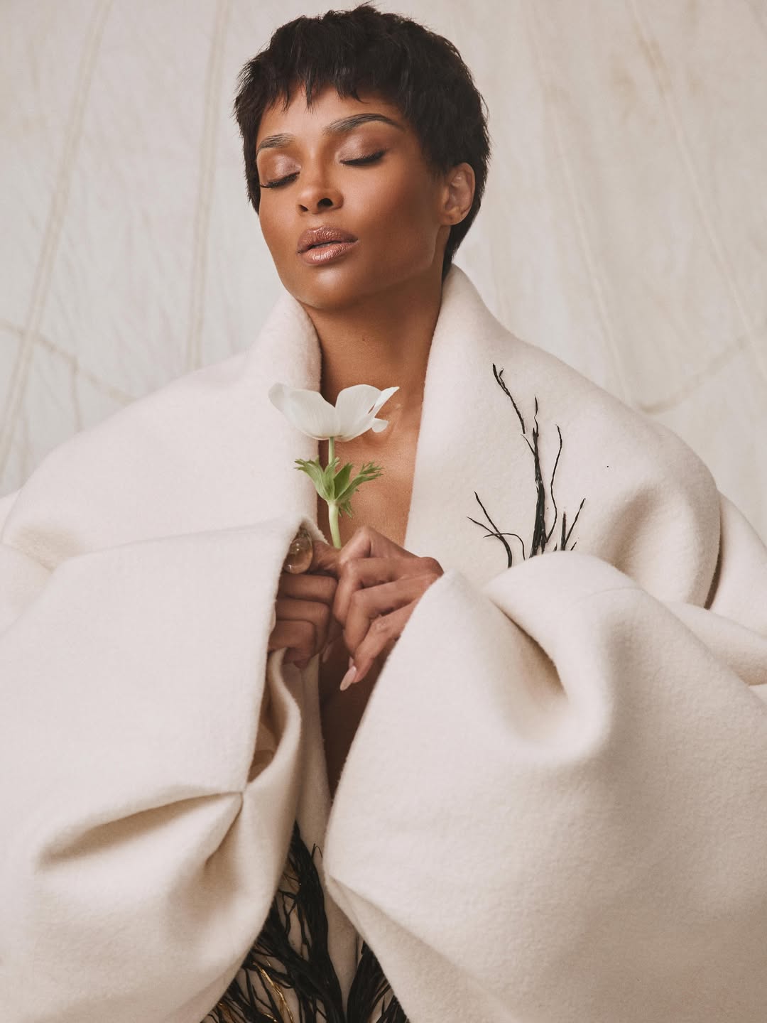 Ciara embraces a calm mood while wrapped in an oversized coat | Source: Instagram/ciara