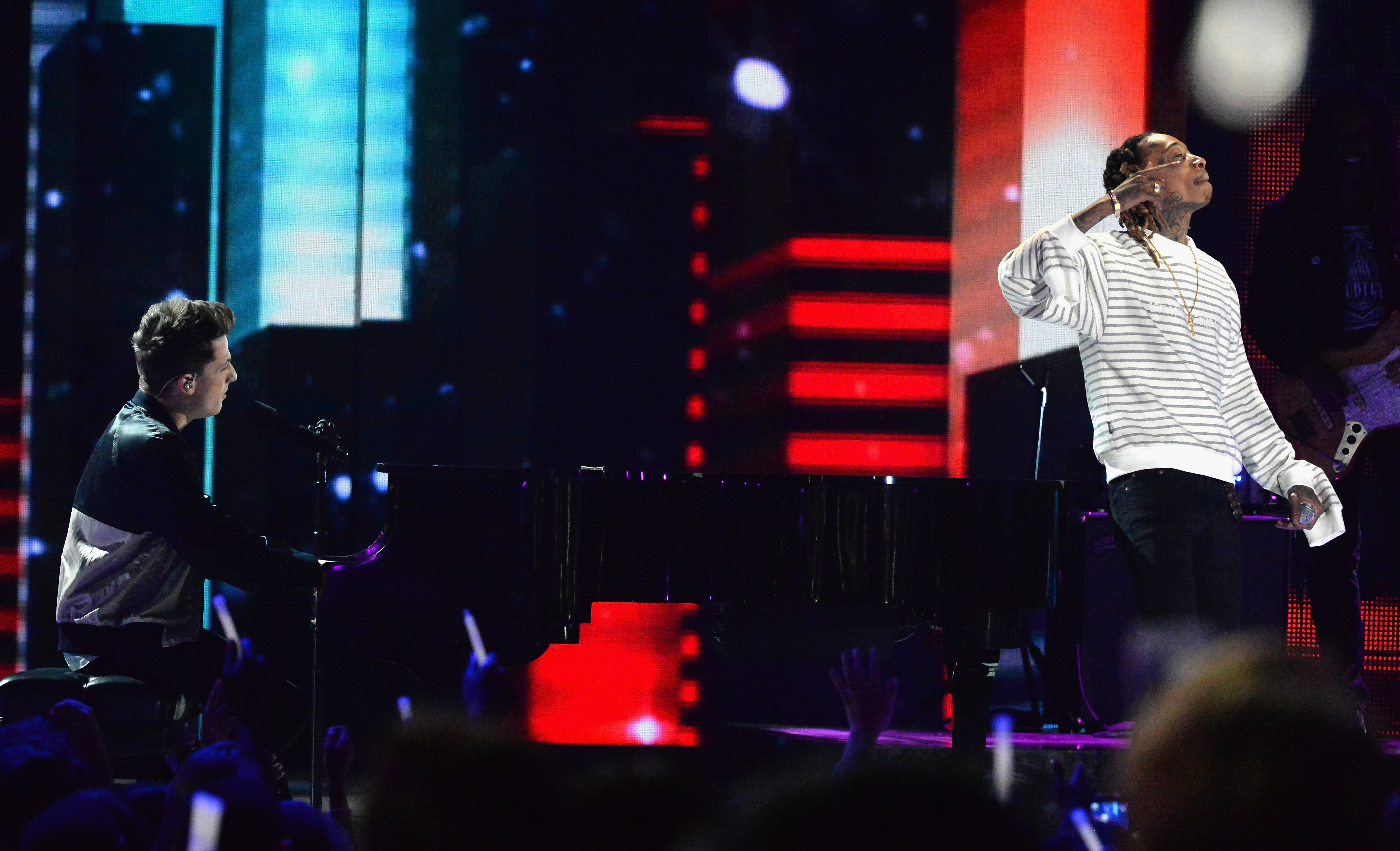 Charlie Puth and Wiz Khalifa perform onstage during Nickelodeon's 2016 Kids' Choice Awards at The Forum on March 12, 2016, in Inglewood, California. | Source: Getty Images