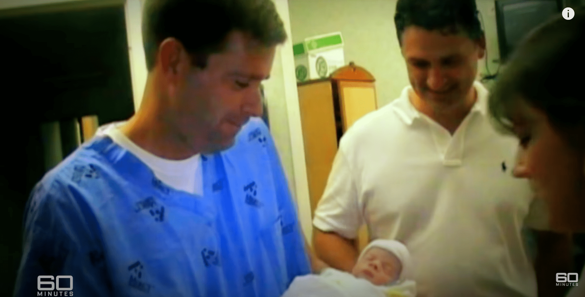 Sean Savage handing over Logan to his biological mother. | Source: youtube.com/60 Minutes Australia