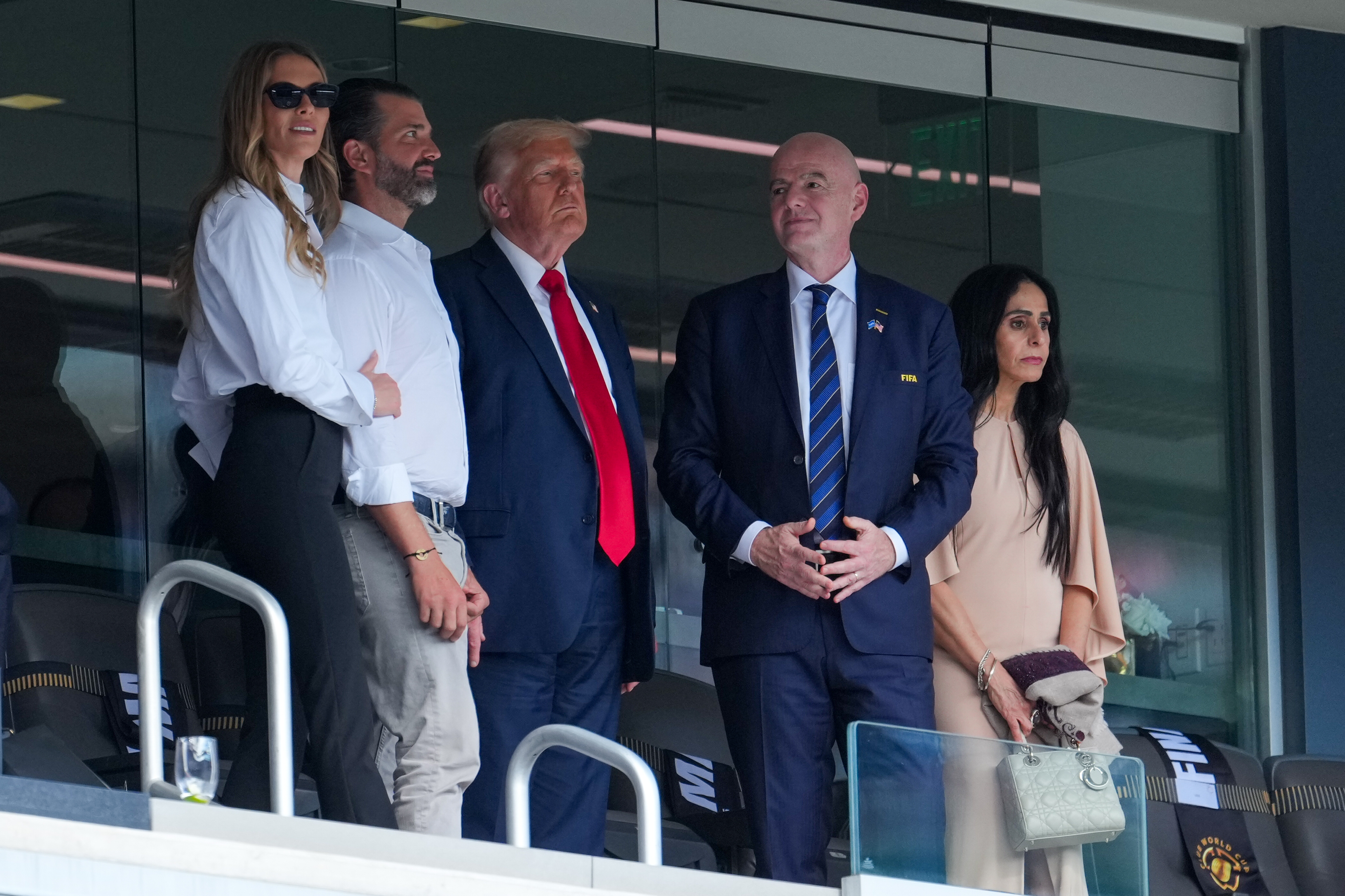 Bettina Anderson, Gianni Infantino, and Leena Al Ashqar with Donald and Donald Trump Jr. during the FIFA Club World Cup final on July 13, 2025. | Source: Getty Images