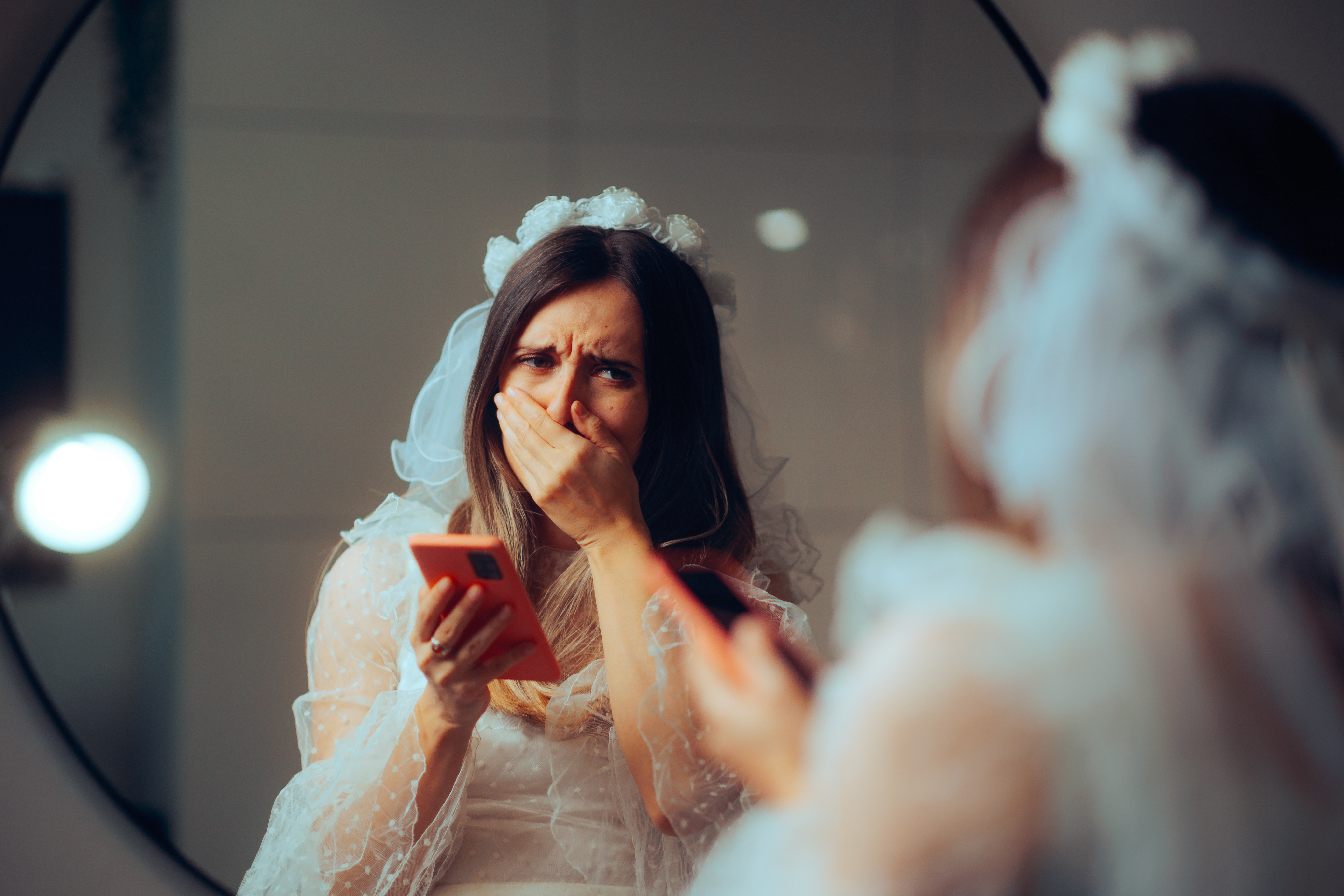 Stressed bride finding out her fiance is cheating on her | Source: Getty Images