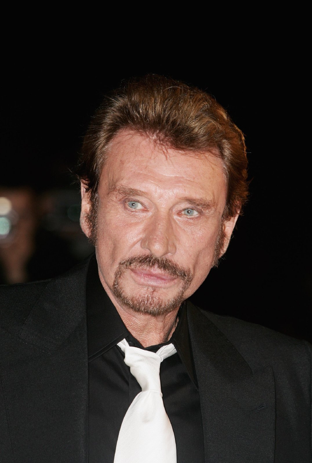 Johnny Hallyday au Virgin Megastore Champs-Elysées le 27 mars 2011 à Paris, France. | Photo : Getty Images