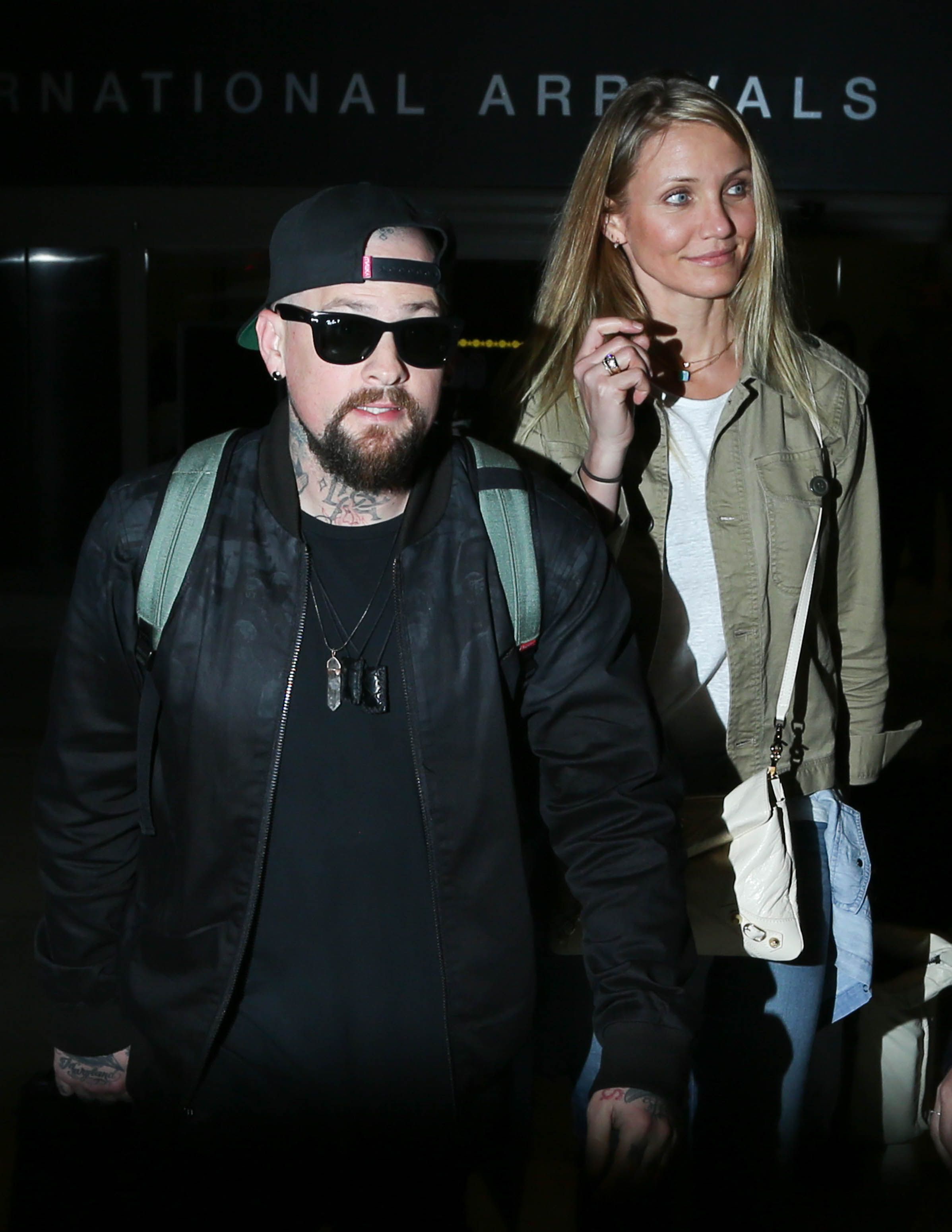 Cameron Diaz and Benji Madden at LAX on August 31, 2015, in Los Angeles, California. | Source: Getty Images