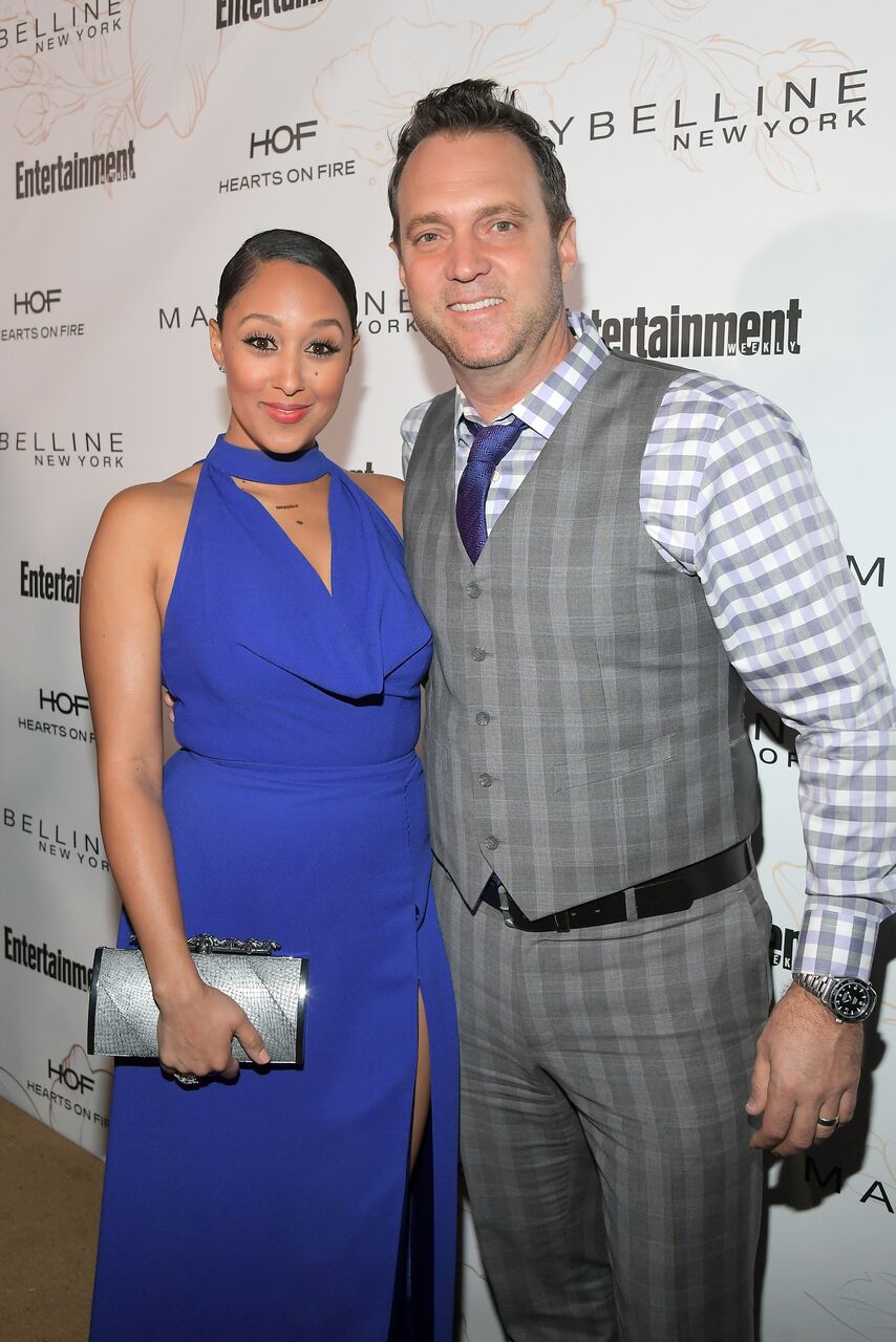 Tamera Mowry and Adam Housley attend Entertainment Weekly's Screen Actors Guild Award Nominees Celebration. | Source: Getty Images