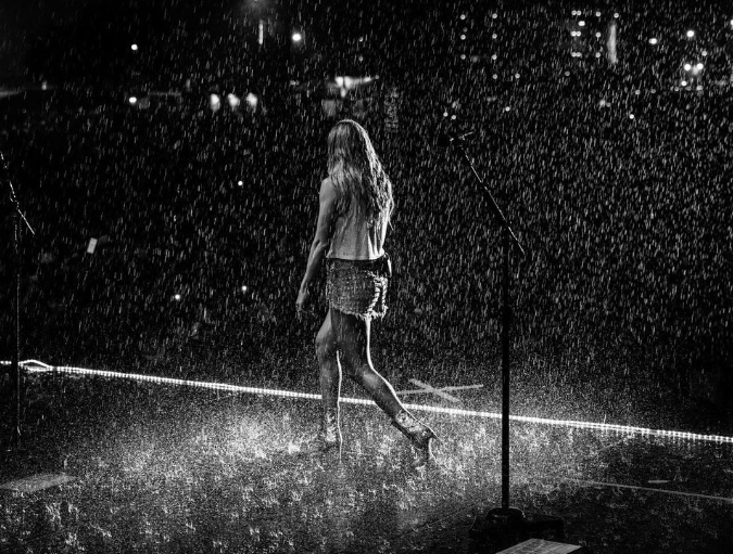 Carrie Underwood performing at the Carolina Country Music Festival during heavy rainfall, posted on June 10, 2024 | Source: Instagram/carrieunderwood