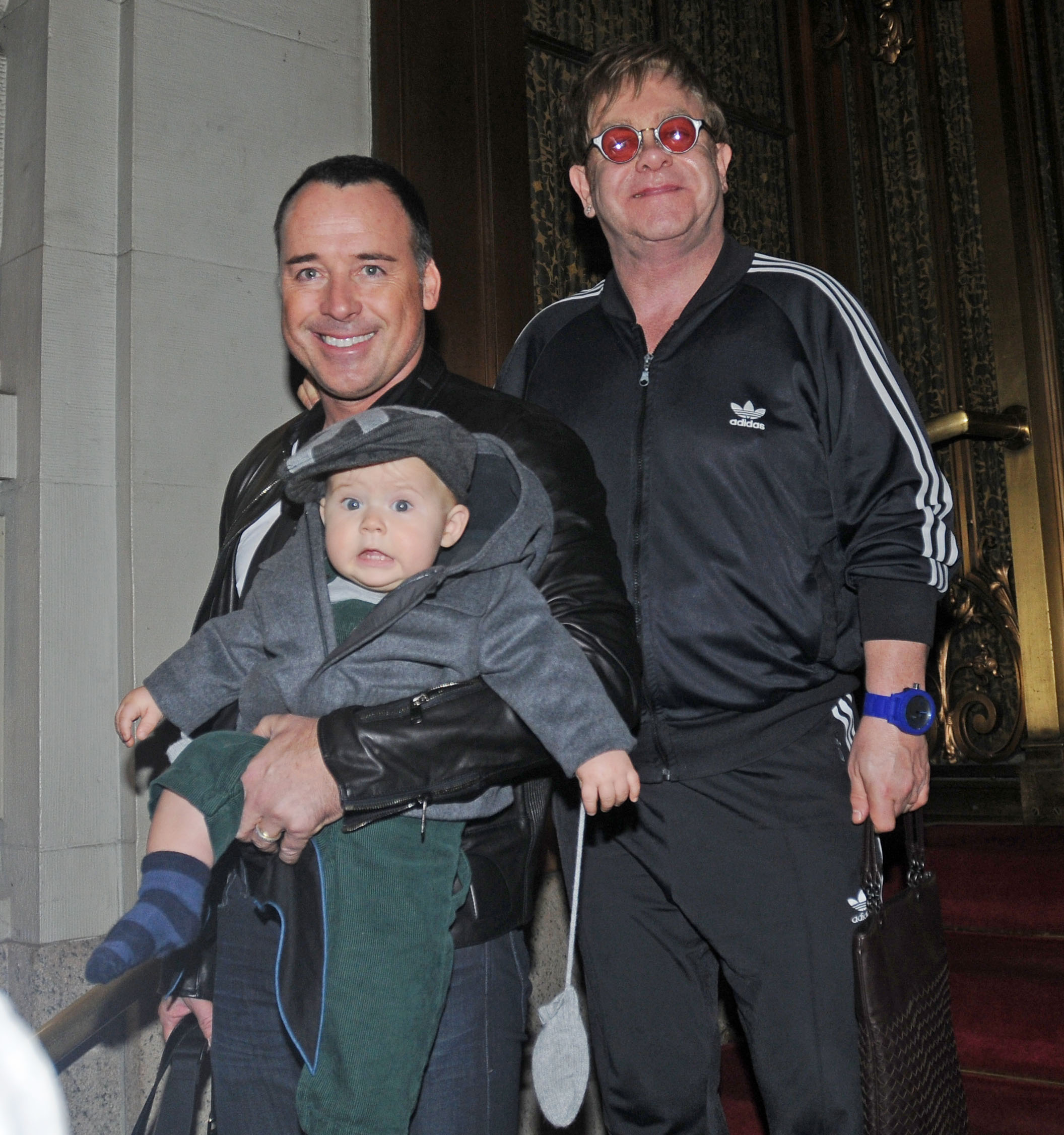 David Furnish and Elton John with their son Zachary in New York in 2011 | Source: Getty Images