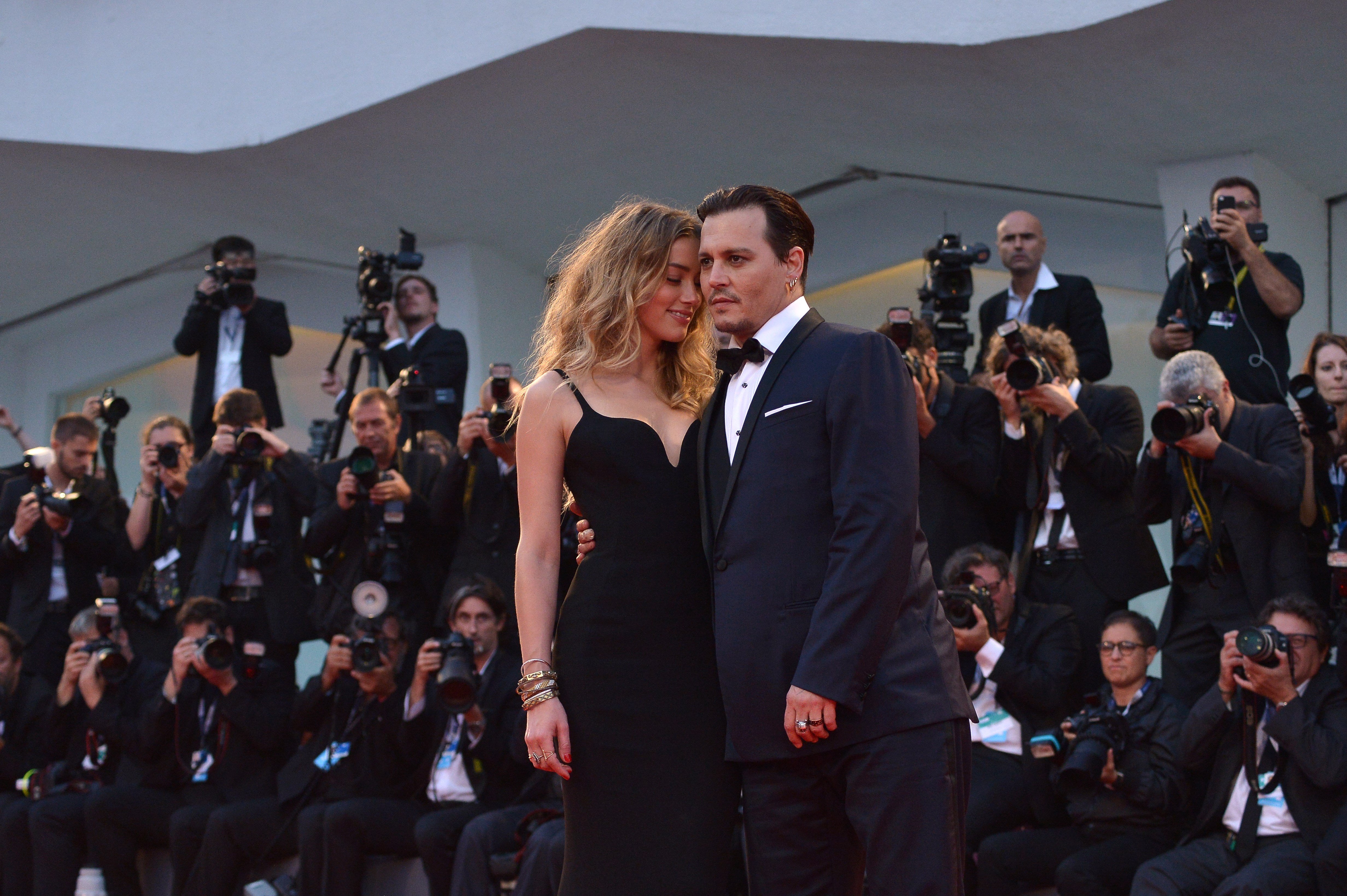 Johnny Depp and Amber Heard arrive for screening of the movie "Black Mass" presented out of competition at the 72nd Venice International Film Festival on September 4, 2015 at Venice Lido. | Source: Getty Images