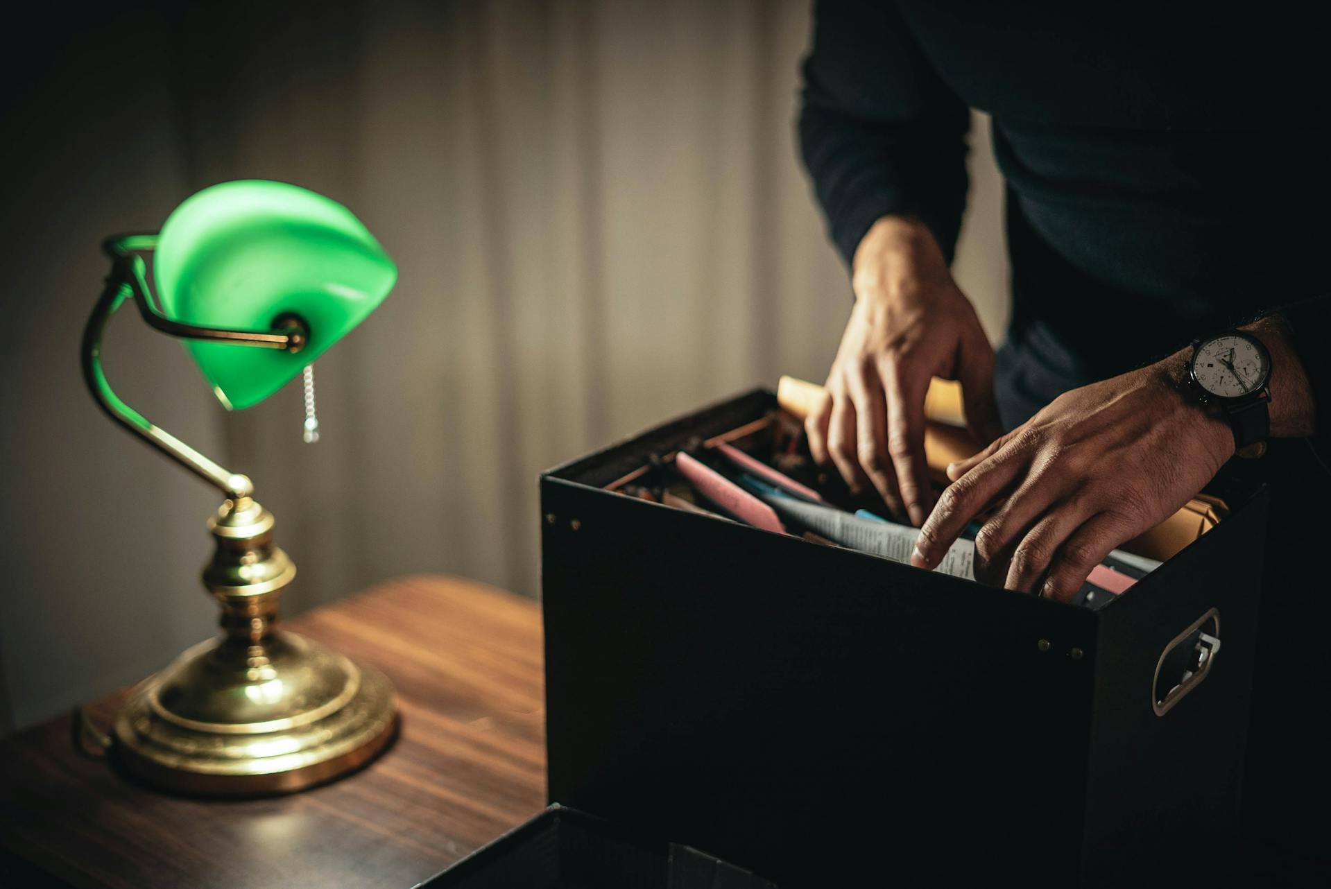 A man looking through a folder | Source: Pexels