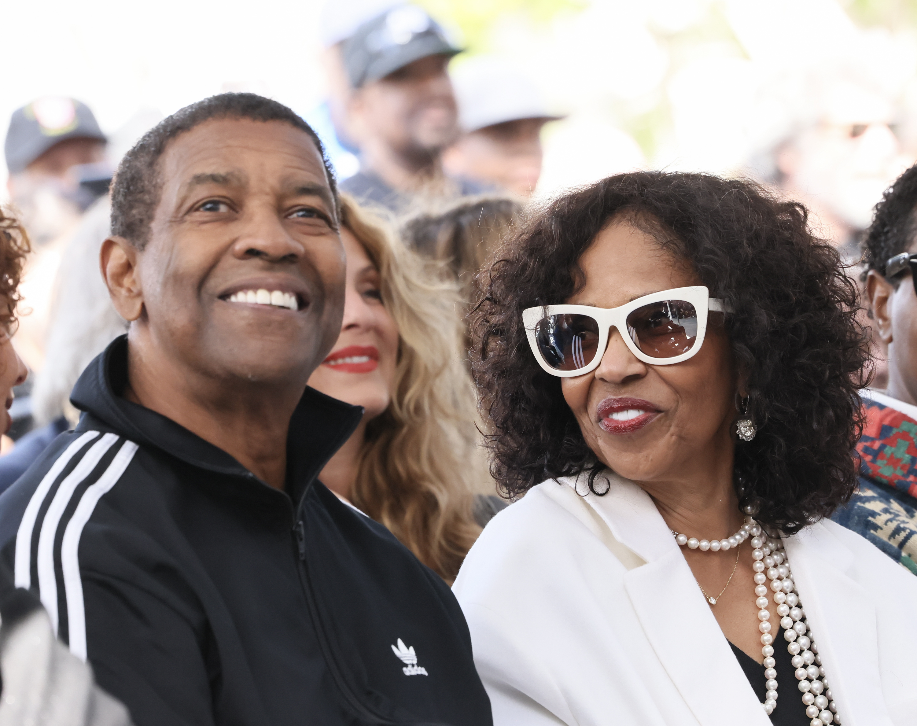 Denzel and Pauletta Washington attend Lenny Kravitz Hollywood Walk of Fame Star ceremony on March 12, 2024, in Hollywood, California. | Source: Getty Images