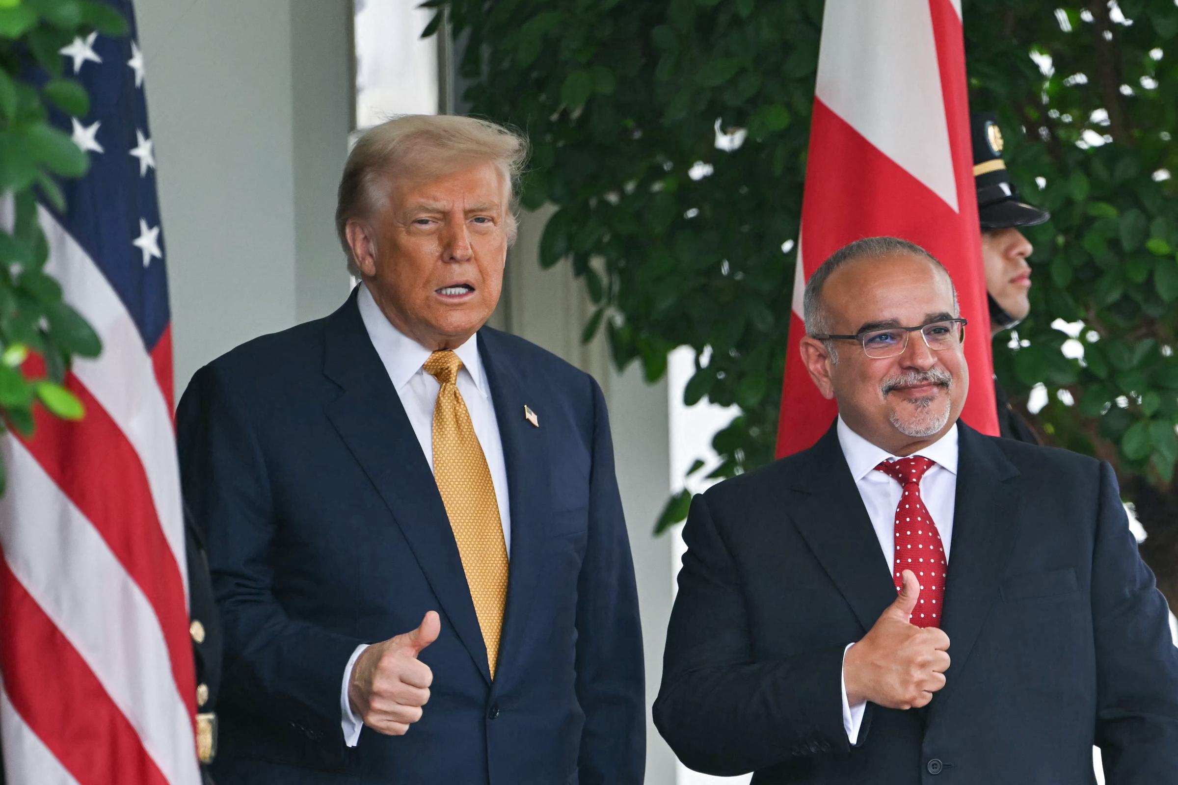 Donald Trump welcoming Bahrain's Crown Prince Salman bin Hamad al-Khalifa to the White House at the West Wing entrance in Washington, D.C., on July 16, 2025. | Source: Getty Images