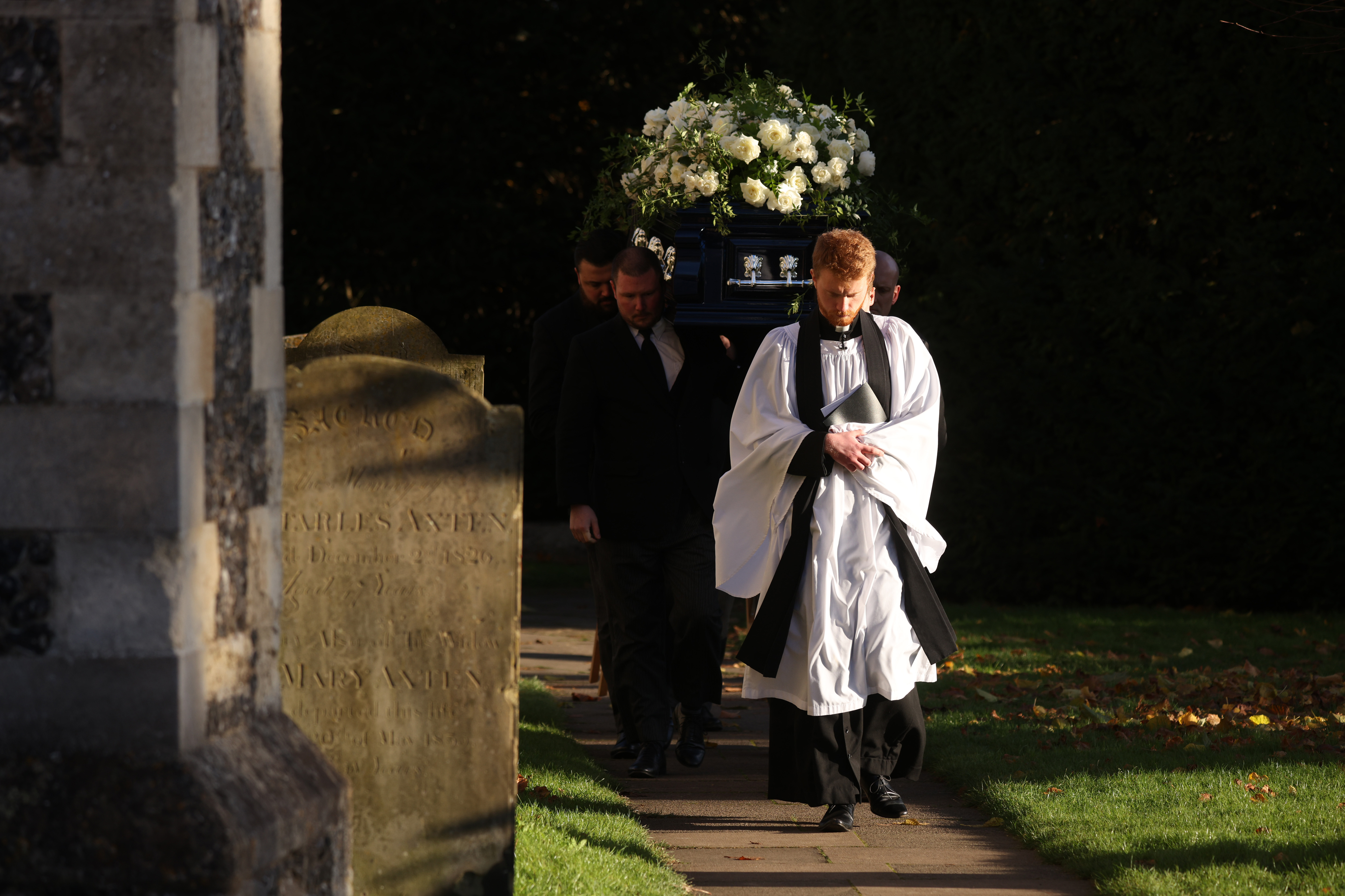 A priest leads the coffin out after Liam Payne's funeral in Amersham, United Kingdom, on November 20, 2024 | Source: Getty Images