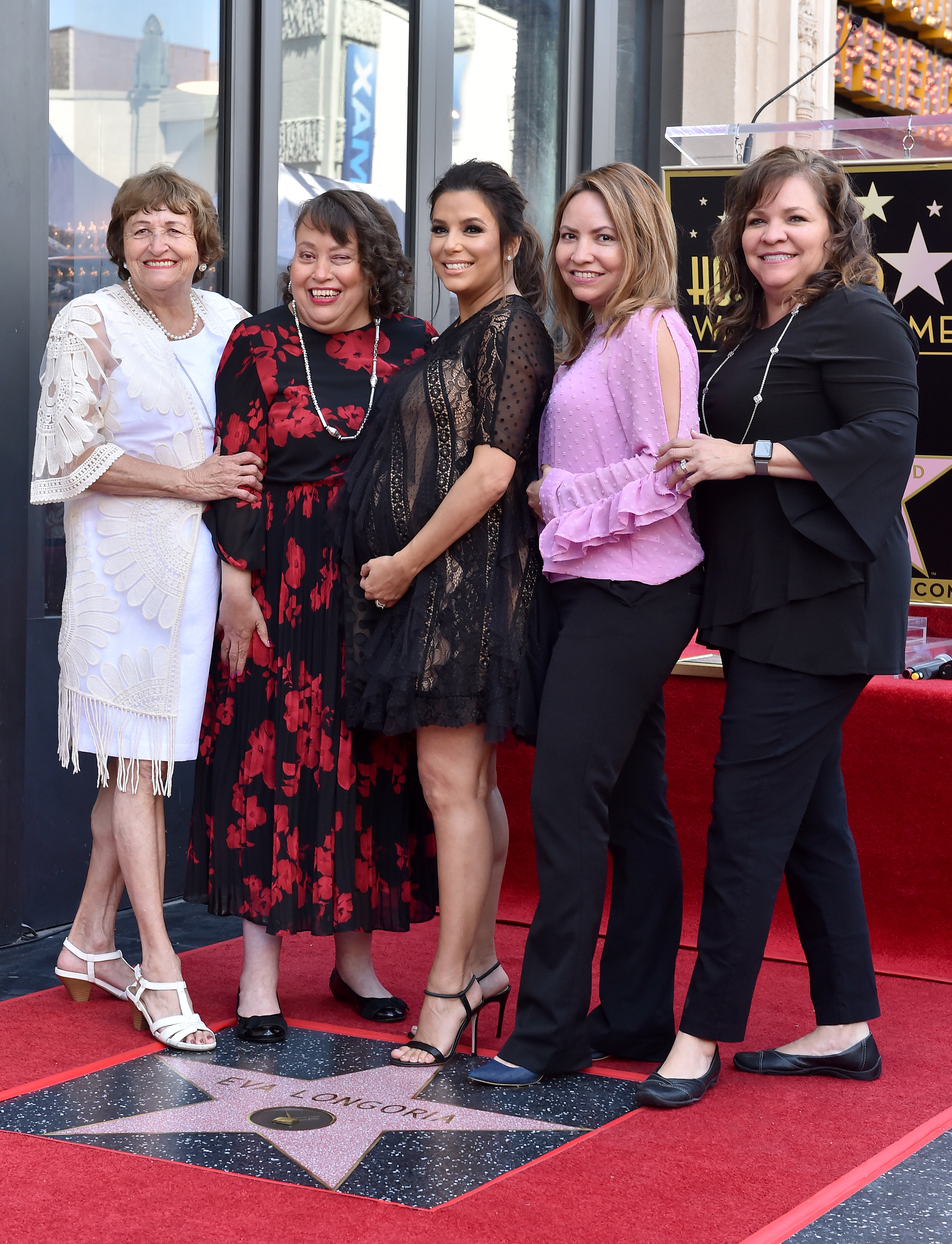 Eva Longoria, her mother Ella Eva Mireles, and sisters Esmeralda Josephina, Elizabeth Judina, and Emily Jeannette Longoria at the ceremony honoring her with a star on the Hollywood Walk of Fame on April 16, 2018, in Hollywood, California