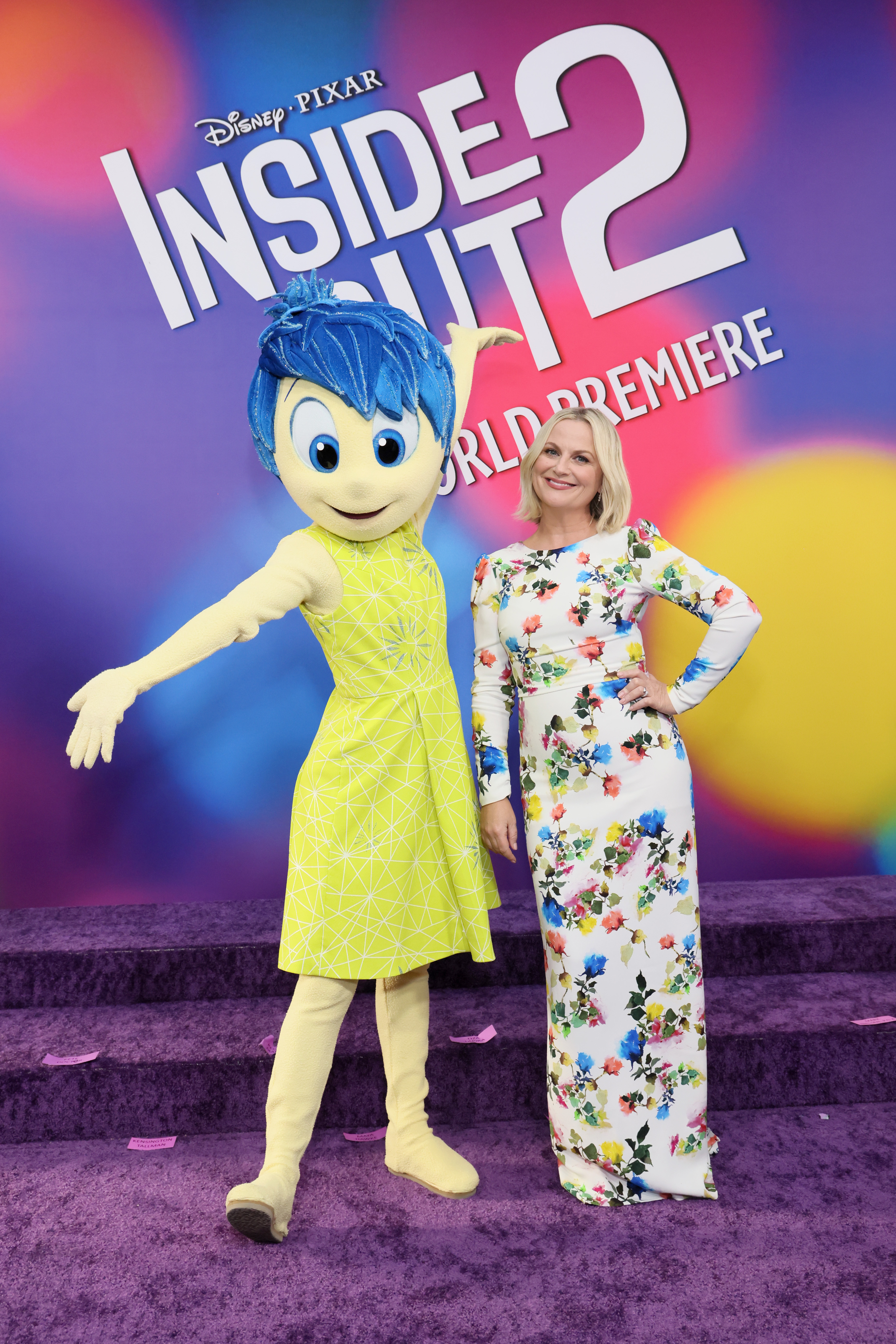 Amy Poehler standing next to her character Joy at the world premiere of "Inside Out 2" in Hollywood, California on June 10, 2024 | Source: Getty Images