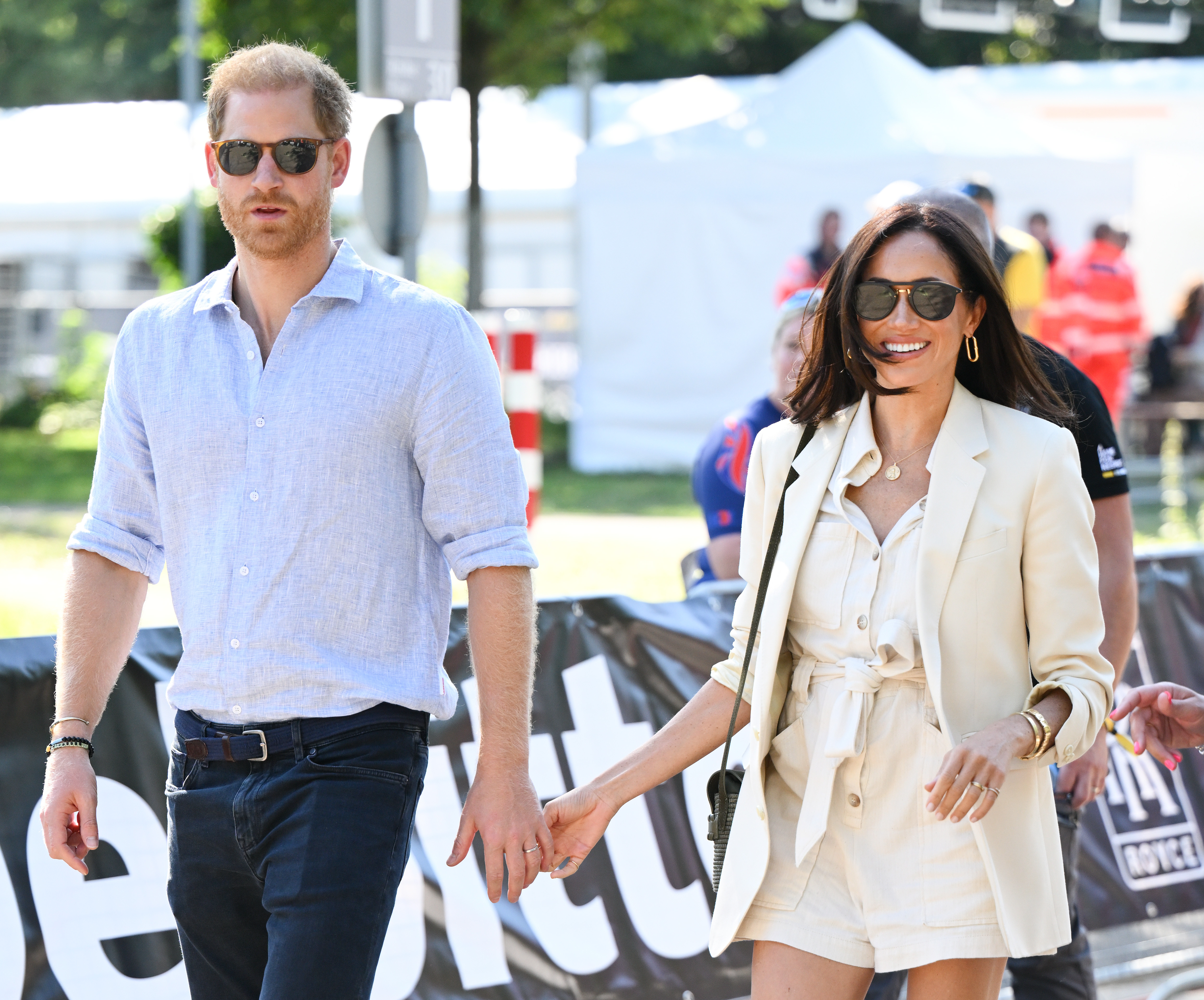 Prince Harry and Meghan Markle attending the cycling medal ceremony at the Cycling Track during day six of the Invictus Games in Düsseldorf, Germany on September 15, 2023 | Source: Getty Images