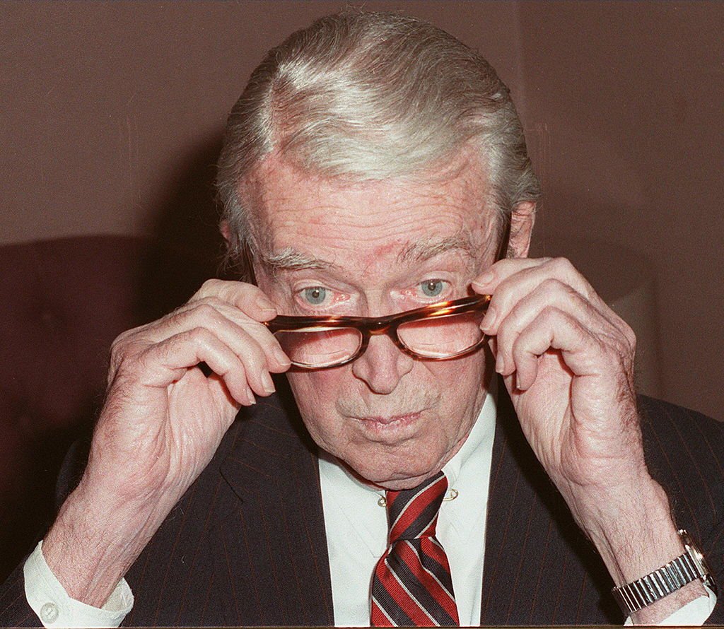US actor James Stewart adjusting his glasses during a press conference at the National Press Club on December 2, 1987. | Photo: Getty Images