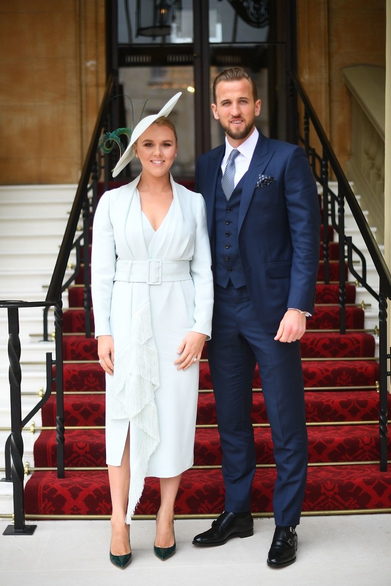 Harry Kane and Kate Goodland at Buckingham Palace on March 28, 2019 in London, England | Photo: Getty Images