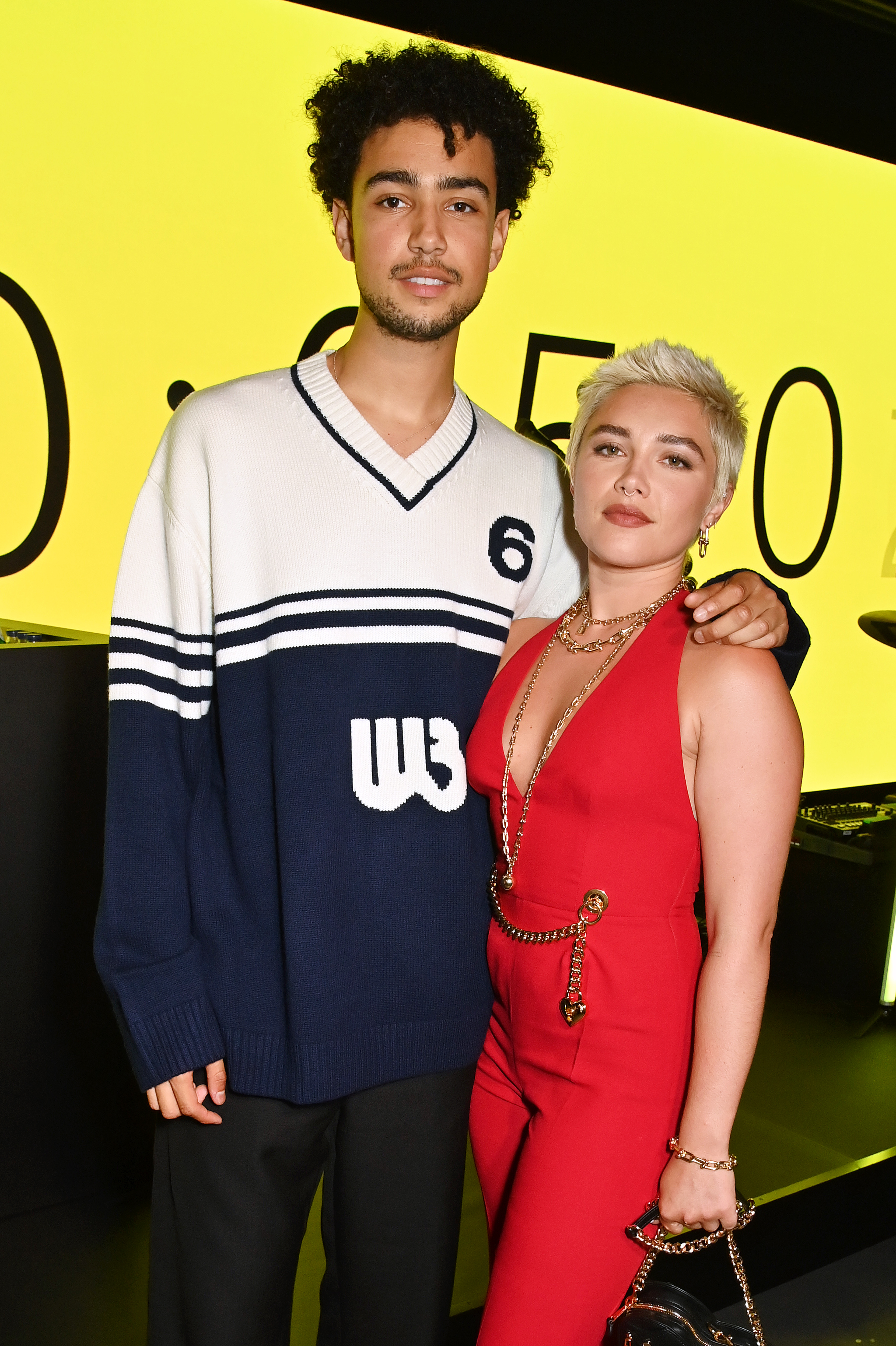 Archie Madekwe and Florence Pugh at the launch of Lotus London, the first flagship in Europe for Lotus cars, on July 27, 2023, in London, England. | Source: Getty Images