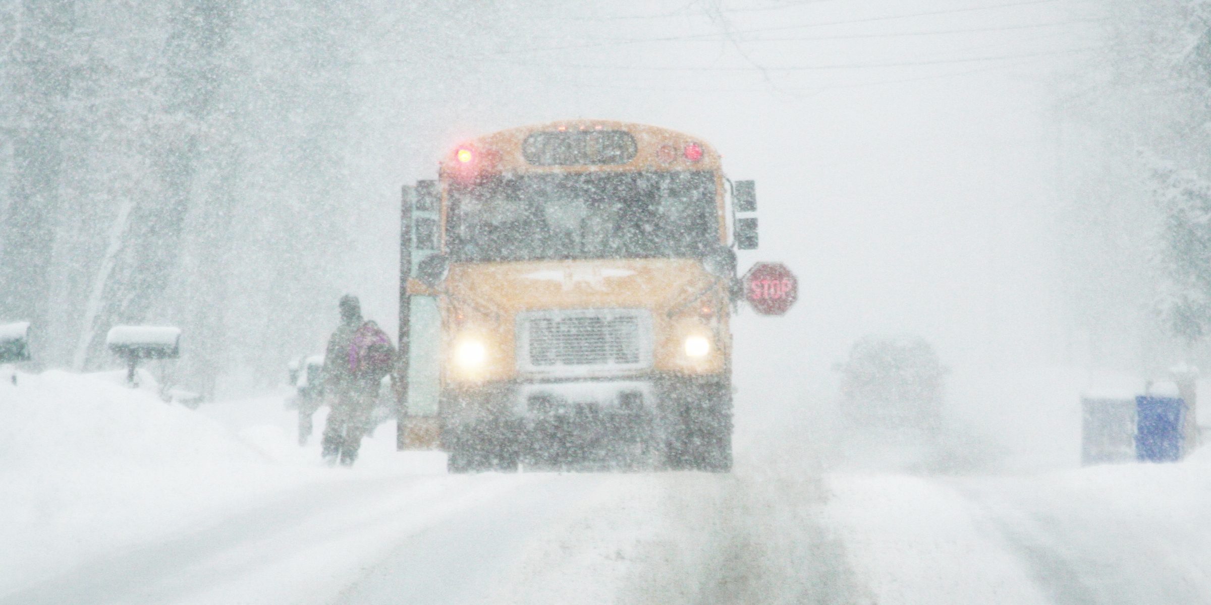 A yellow school bus in a winter storm | Source: Getty Images