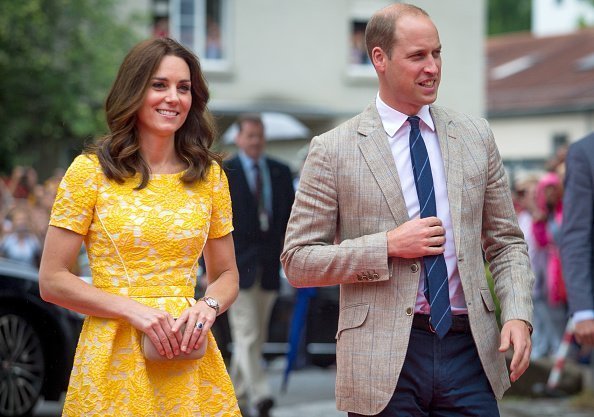 Britain's Prince William and his wife Catherine, Duchess of Cambridge, arrive at the Deutsches Krebsforschungszentrum in Heidelberg, Germany, 20 July 2017. | Photo: Getty Images