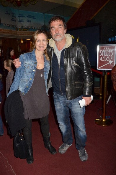 Catherine Marchall et Olivier Marchal assistent à 'Le Cirque Eloize'. | Photo : Getty Images