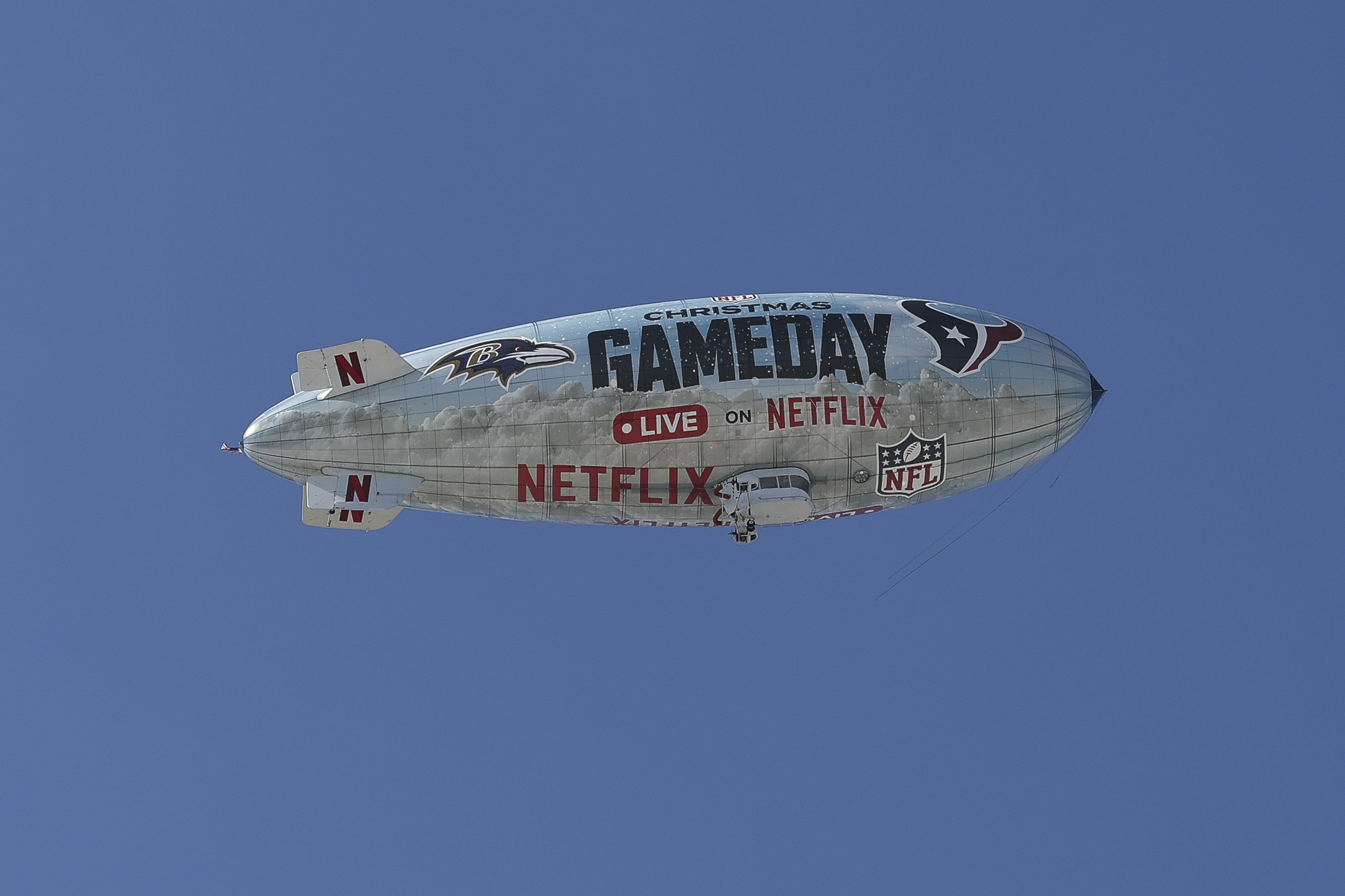 NFL Christmas Gameday signage on a blimp advertising the NFL's two Christmas Day marquee games streaming live on Netflix in New Orleans, Louisiana, on December 1, 2024 | Source: Getty Images