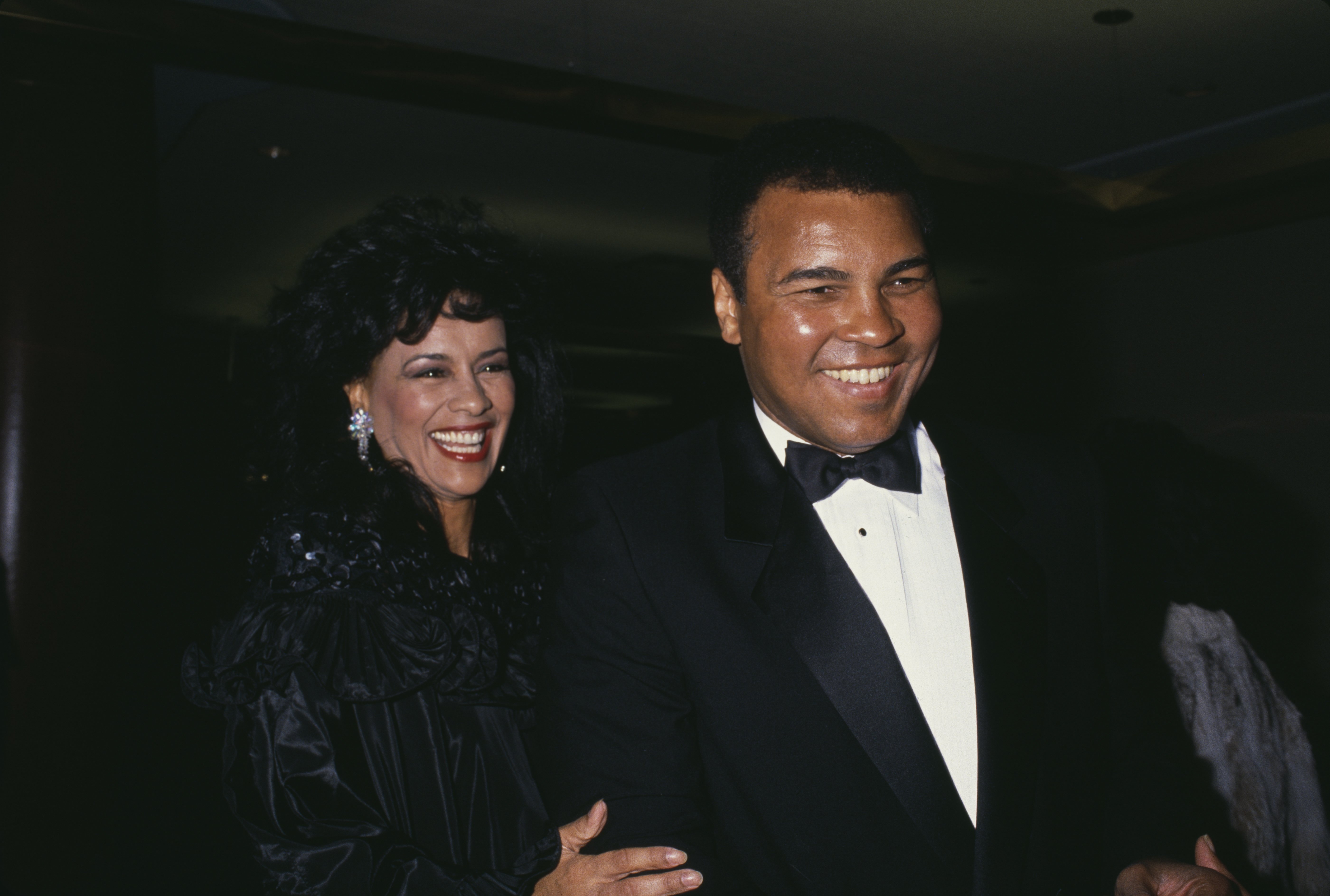 Veronica Porché and Muhammad Ali attend an event in 1985. | Source: Getty Images