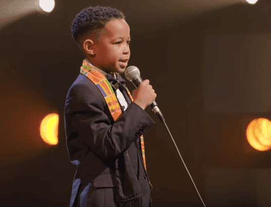 Boy speaking in the documentary, "We Are The Dream: The Kids of the Oakland MLK Oratorical" | Photo: YouTube/HBO 
